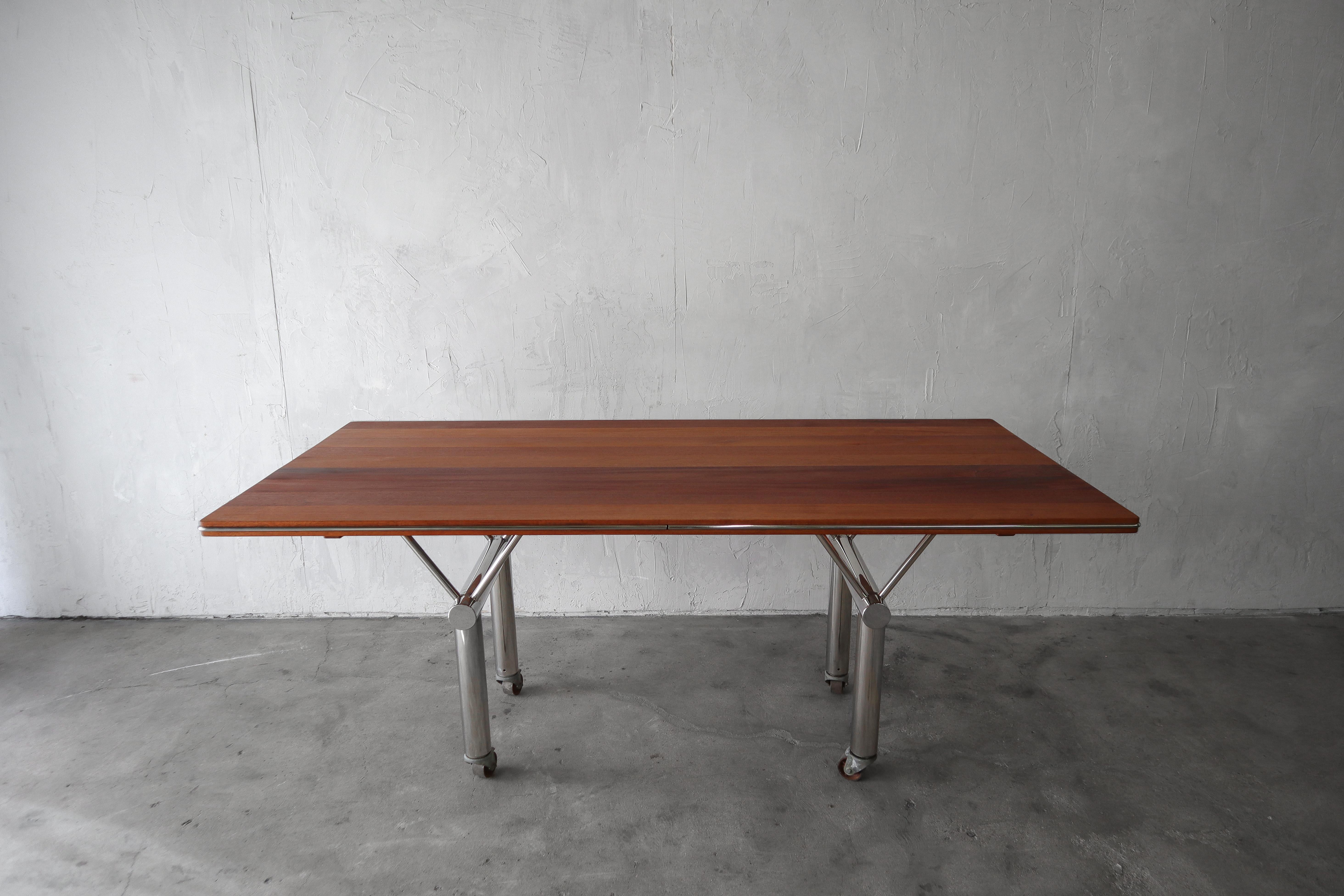 PRICE IS FOR 2 TABLES.  

Gorgeous pair of custom made tables, designed and made for an architectural design firm in Santa Monica in the 1960s.

The tables feature beautiful, solid mahogany plank tops in varying shades and grains set atop Y-shaped