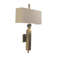 Pair of Mid-Century French Brass Wall Sconces with Sculptural Bust Detail