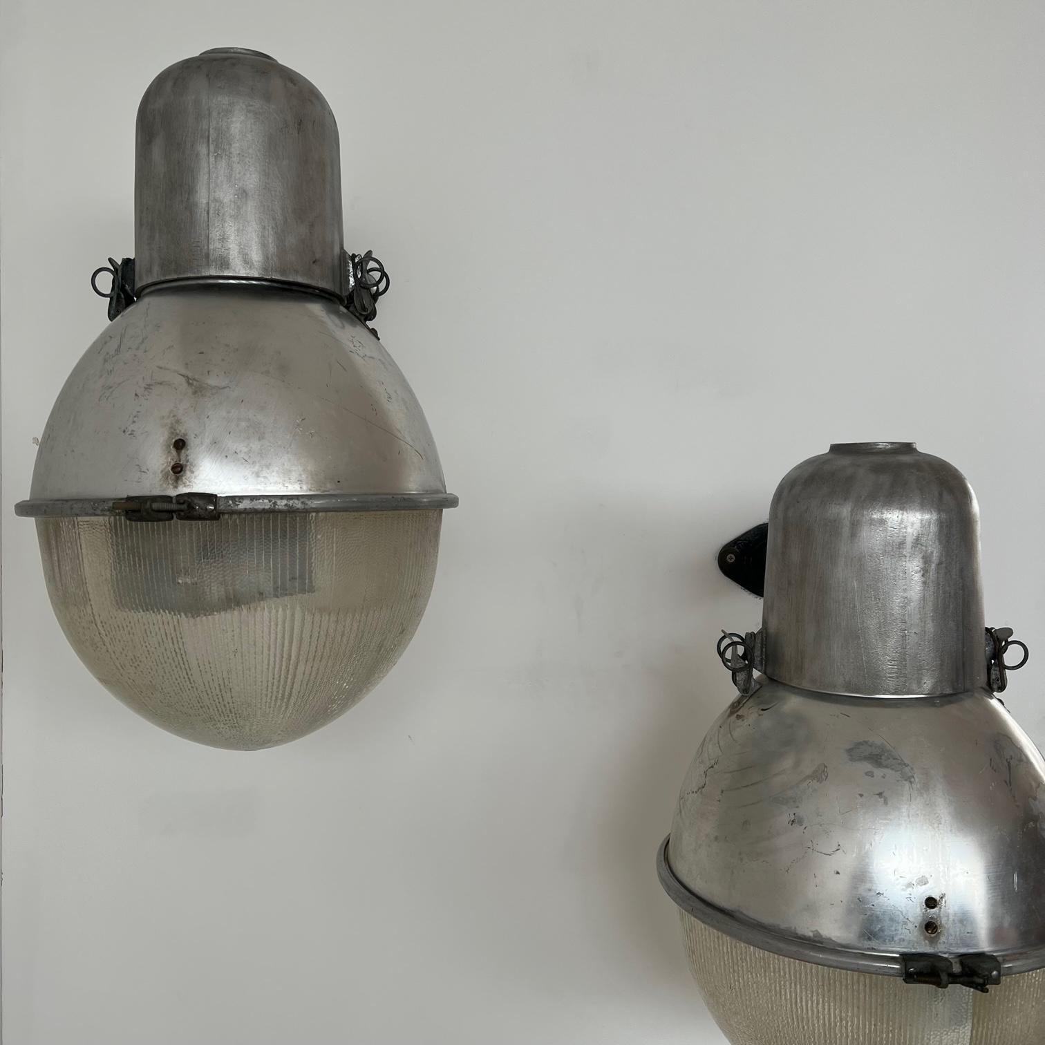 A pair of industrial metal and glass large wall lights. 

Spain, c1950s. 

Good quality original fixtures, 

Since re-wired and PAT tested. 

Good condition, some scuffs and wear commensurate with age. 

Price is for the pair. 

Location: London