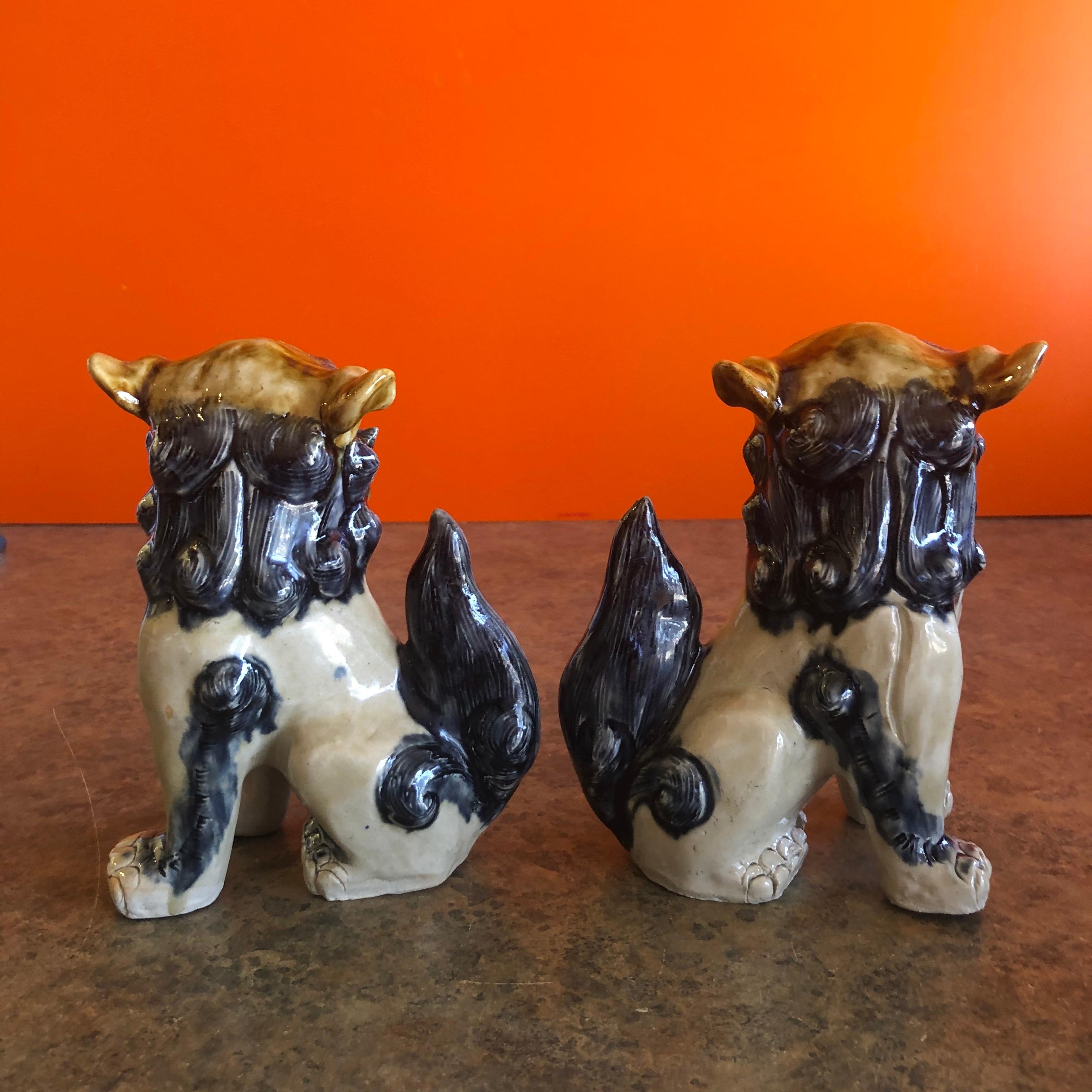 Chinese Pair of Midcentury Stoneware Foo Dogs / Bookends For Sale