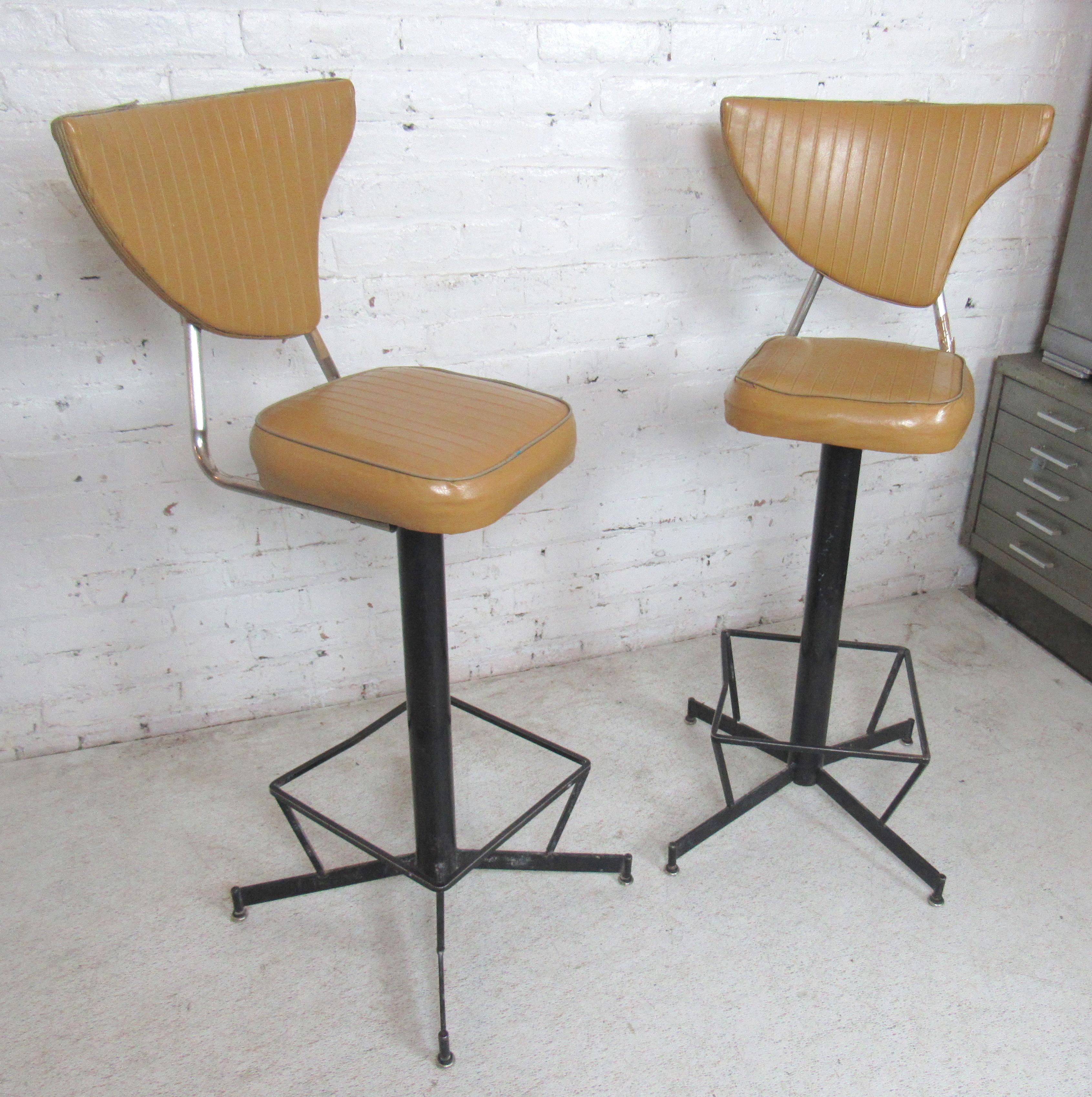 Iron frame stools with unusual backs and metal footrests.
(Please confirm item location - NY or NJ - with dealer).
   