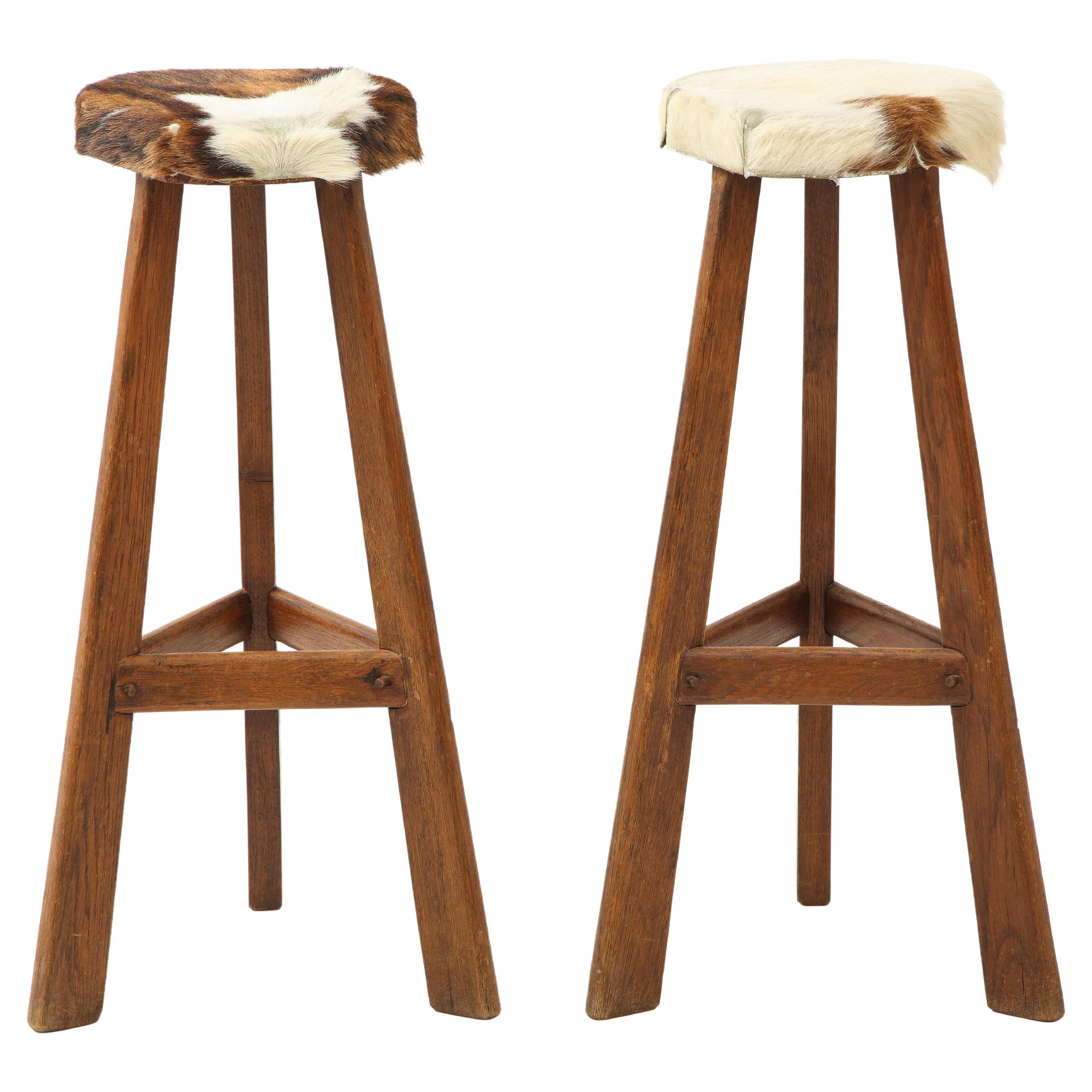 Pair of Midcentury Stools with Cowhide Seats, France, circa 1960 For Sale