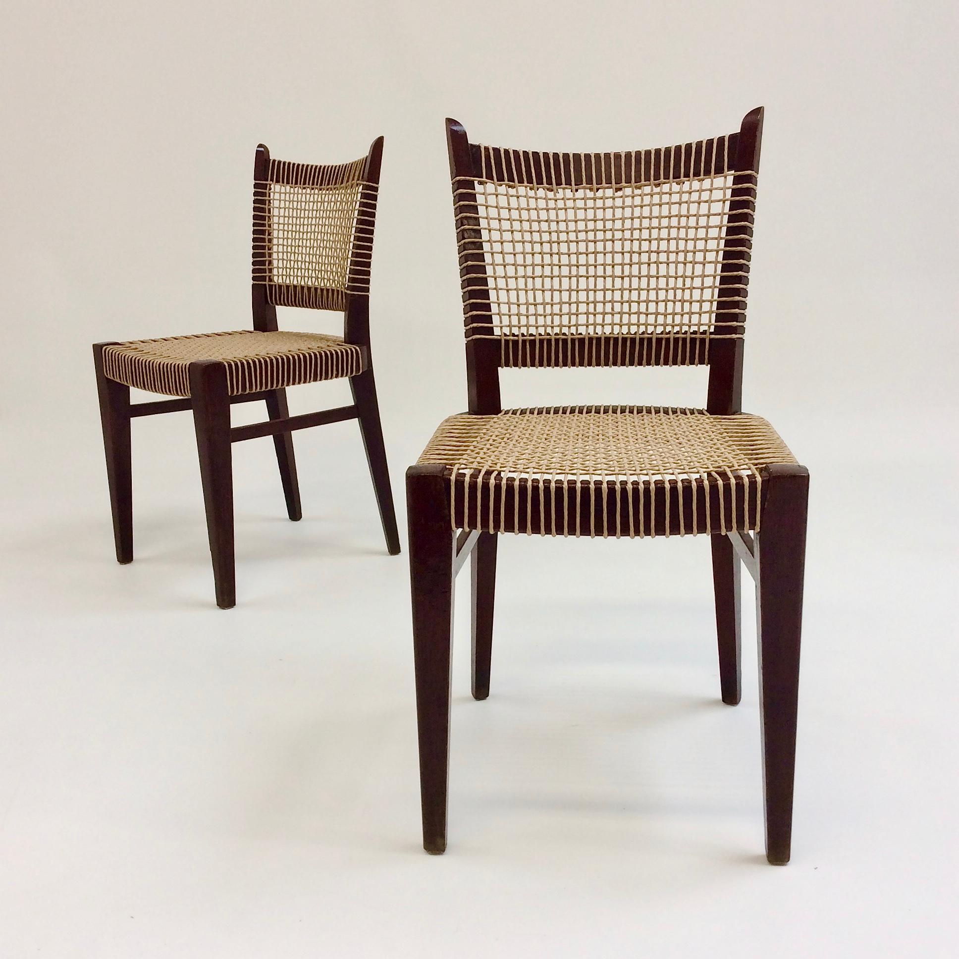 Nice pair of decorative chairs, circa 1950, France.
Woven straw and dark wood.
Dimensions: 83 cm H, seat height: 45 cm, 40 cm D, 42 cm W.
Wood in original condition, new woven straw.
All purchases are covered by our Buyer Protection