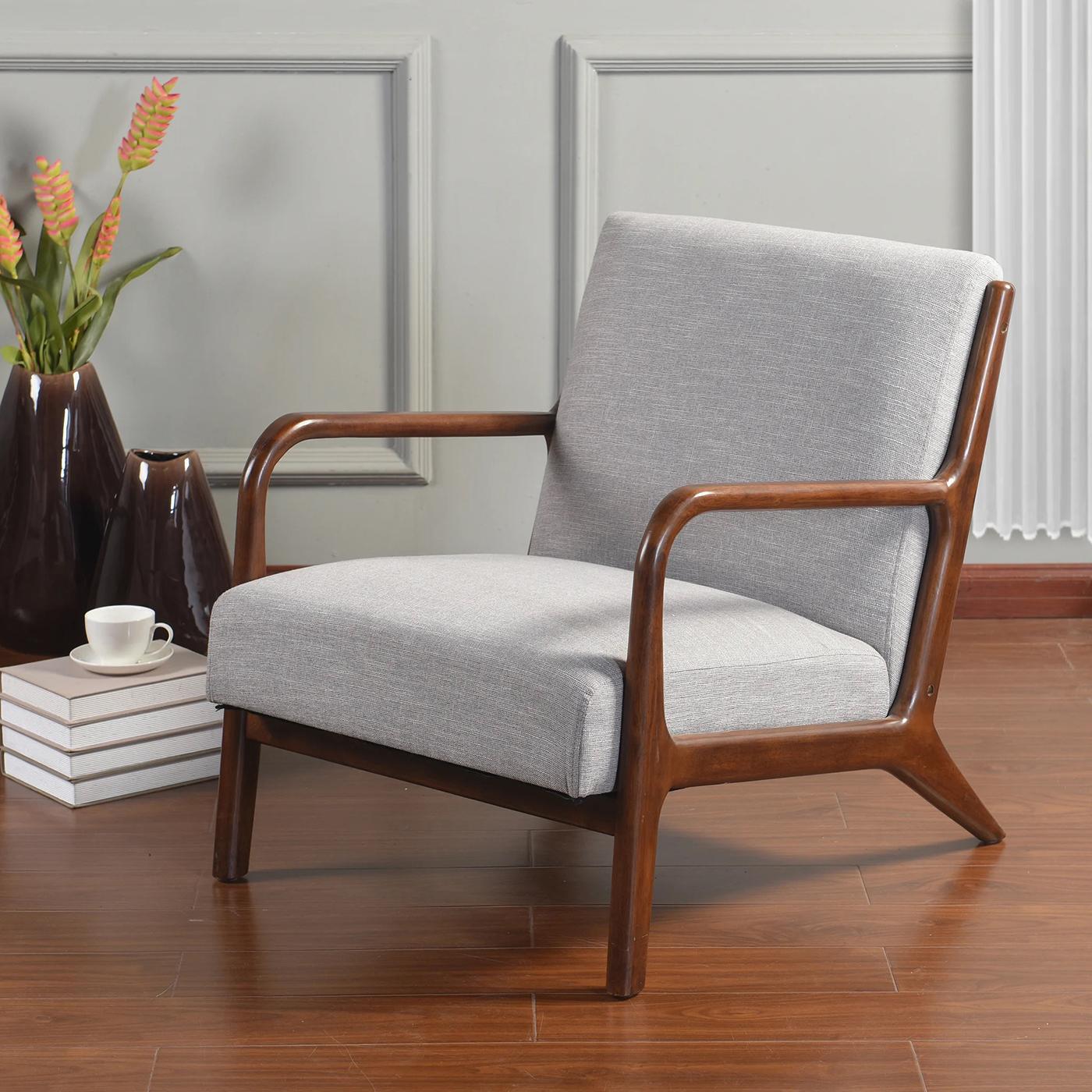 Mid century style Low Lounge Armchairs, the sleek modern frames with an upholstered boxed cushion back and seat. 

Dimensions: 34