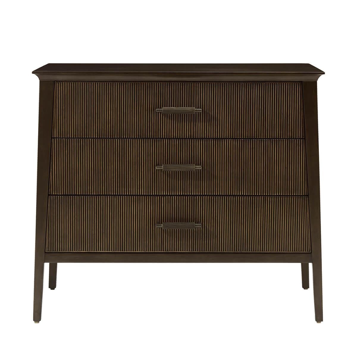 In our Bistre finish, features a sophisticated tapered silhouette with three reeded drawers. The custom forged hardware, finished in a dark rubbed bronze, echoes the reeded details throughout.

Dimensions: 32