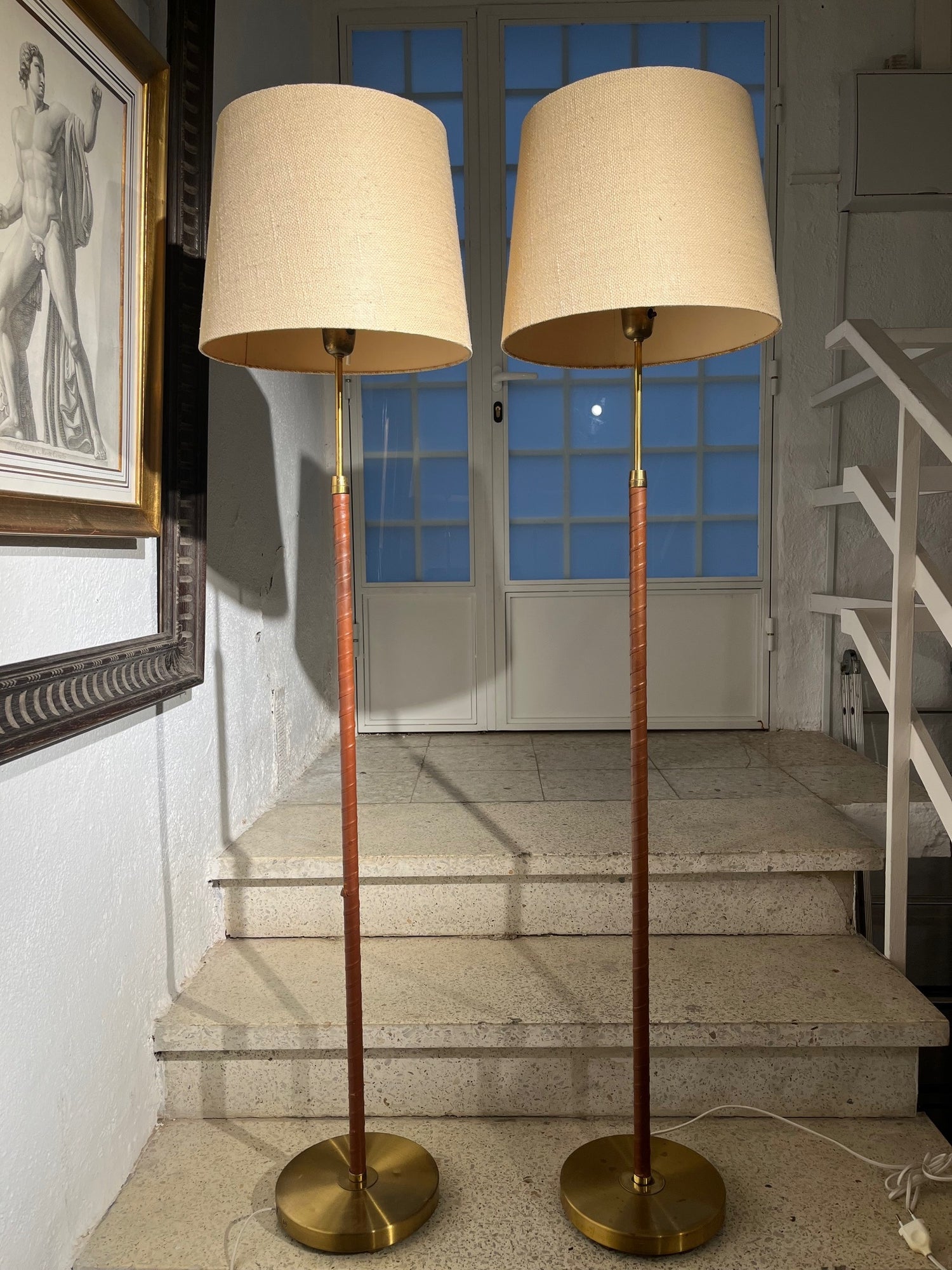 Mid-Century Modern Pair of Mid-Century Sweden Brass and Leather Floor Lamps by Einar Bäckström. For Sale