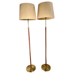 Pair of Mid-Century Sweden Brass and Leather Floor Lamps by Einar Bäckström.