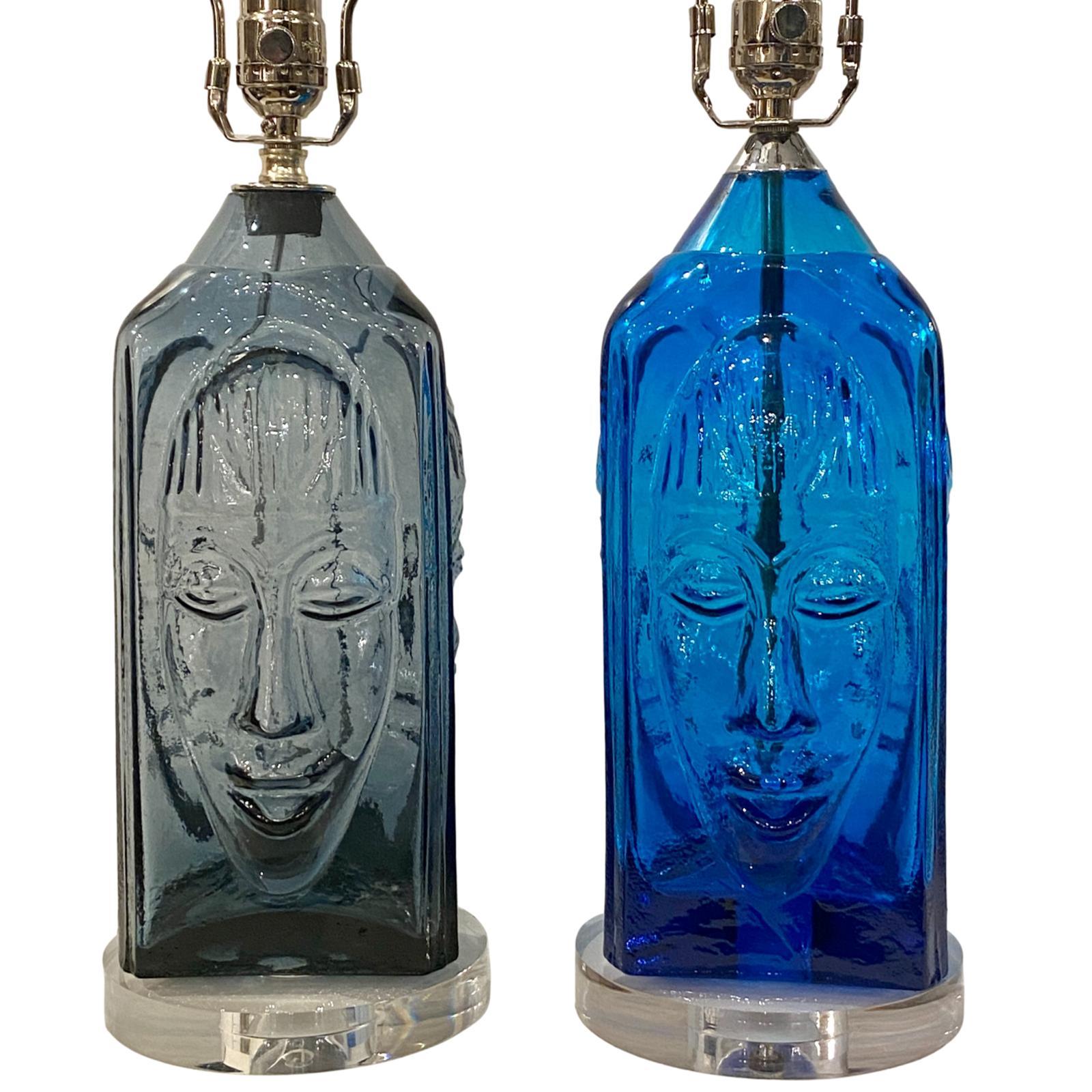 A pair of circa 1960s Swedish molded blue and smoke glass table lamps with Lucite bases and nickel-plated hardware.

Measurements:
Height of body 14