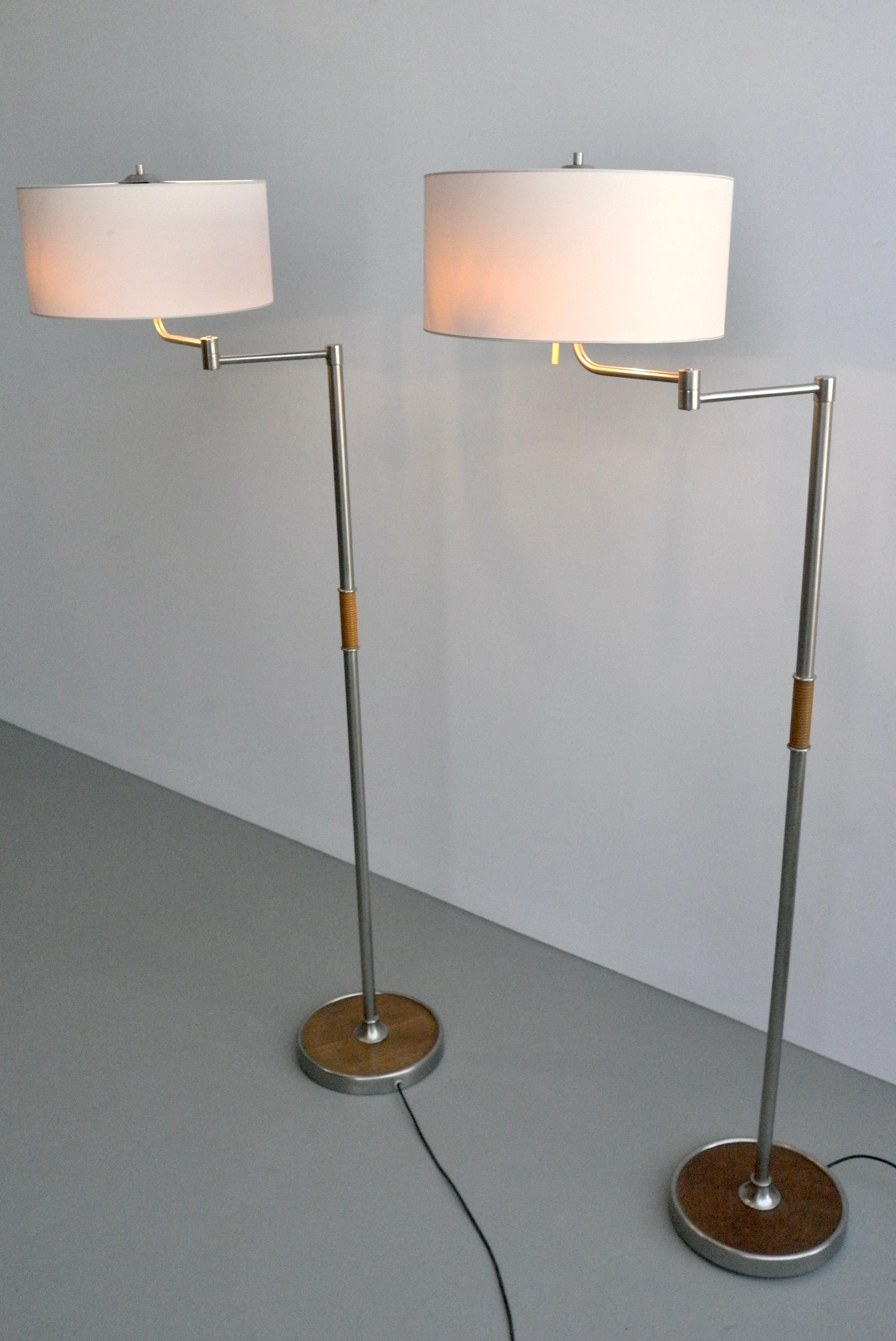 European Pair of Mid Century Swing-Arm Floor Lamps in Metal with Faux Bamboo Wood Details For Sale