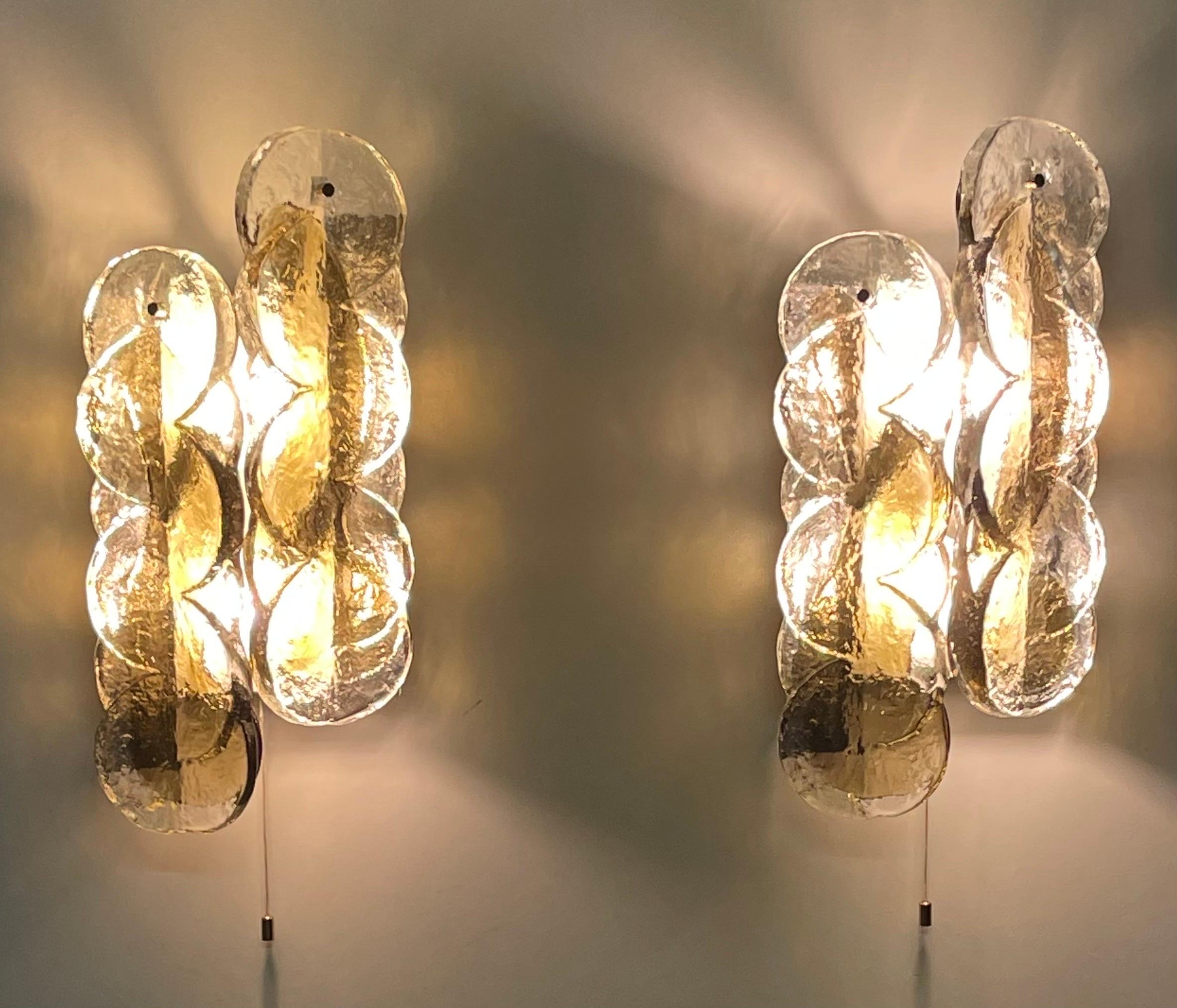 A pair of Mid-Century Modern clear and amber Murano glass wall sconces by J.T. Kalmar, Austria, Vienna, 1960s.
Socket: Each 2 x e14 (for standard screw bulbs).
  
