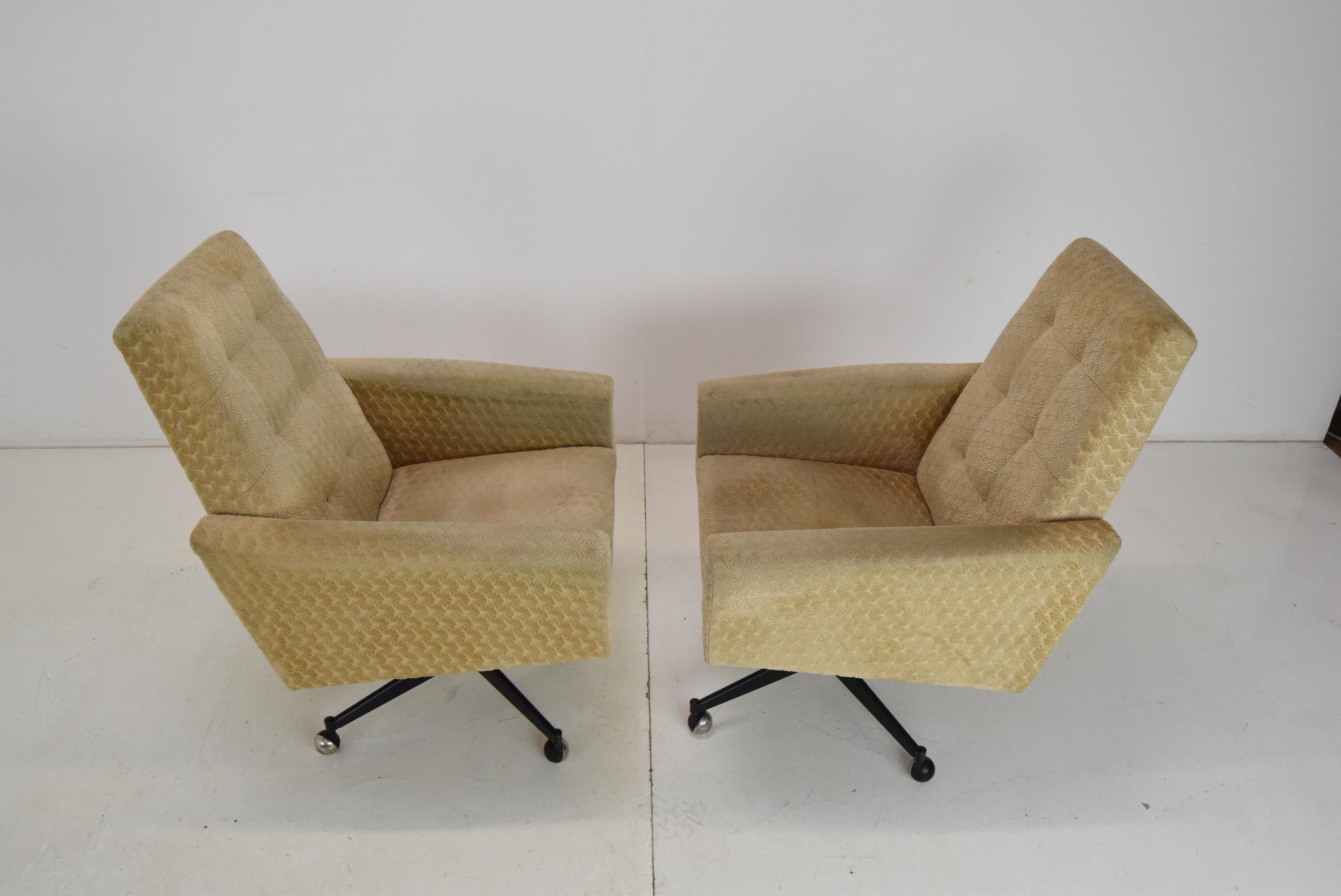 Late 20th Century Pair of Midcentury Swivel Armchairs with Wheels, 1970s.  For Sale