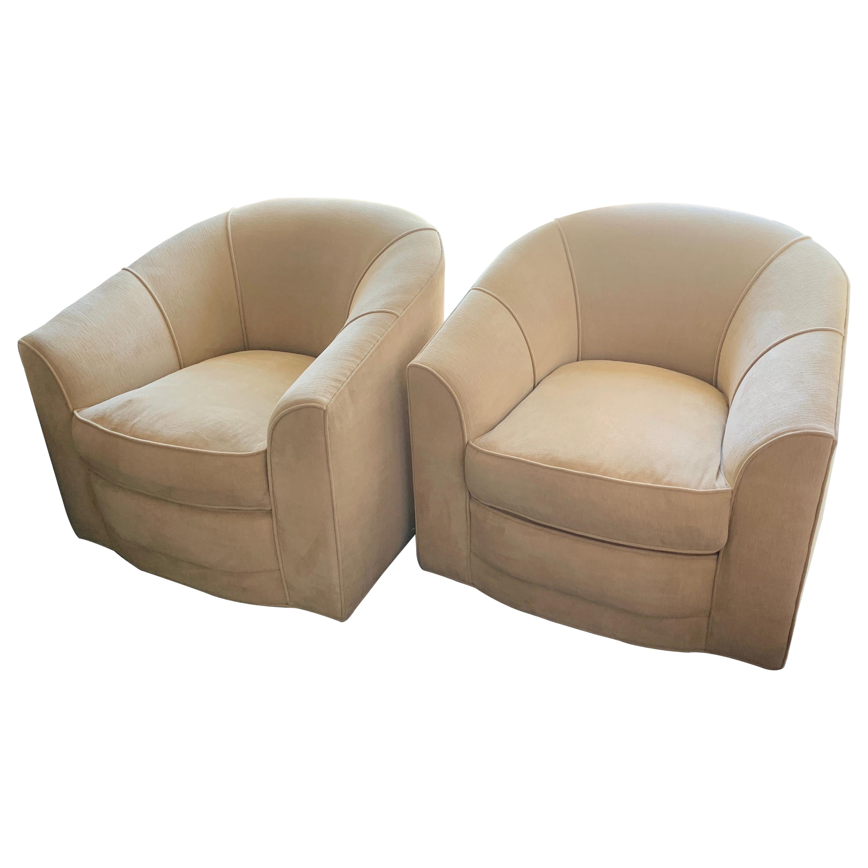 Pair of Swivel Club Chairs in the Style of Milo Baughman