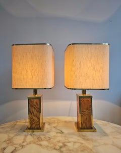 Pareja de lámparas de sobremesa de mediados de siglo, atribuidas a Willy Rizzo, realizadas en madera y latón