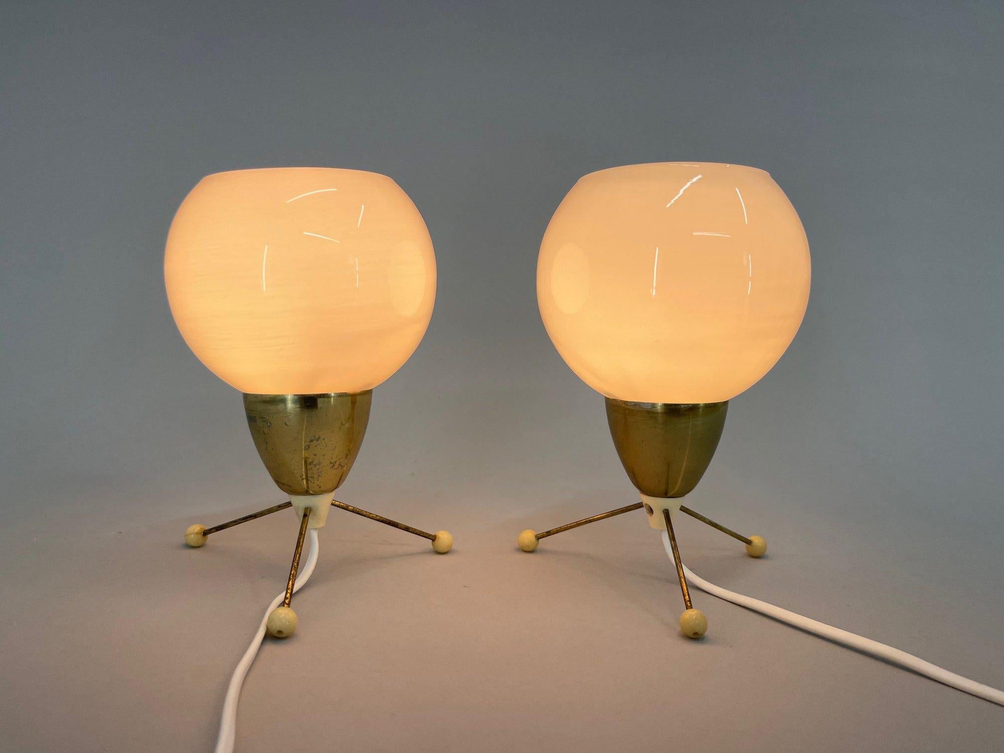 Set of two space age table lamps designed by Stanislav Kucera and produced in Kamenický Šenov in former Czechoslovakia in the 1960's. The bases of the lamps have some signs of use (see photo) and the shades have been replaced.