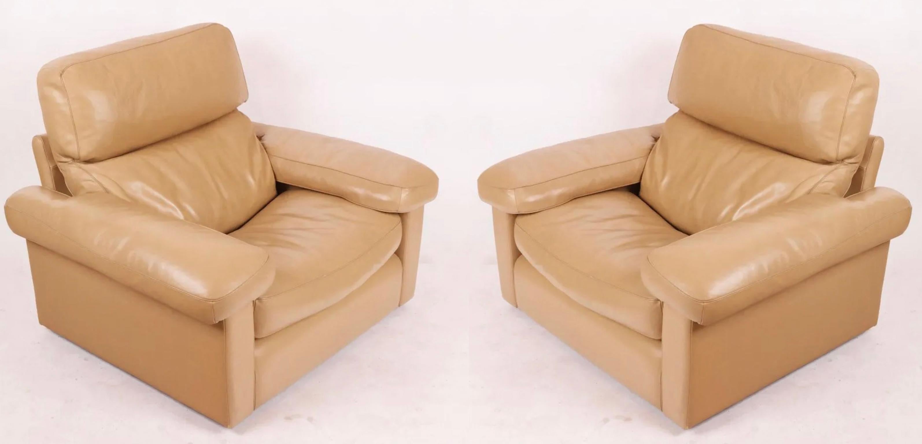 Pair of Vintage Mid-Century Modern Tan leather Lounge matching chairs by Tito Agnoli for Poltrona Frau Italy, circa 1970. Low Modern designed lounge chairs. Very soft Tan leather puffy cushions. Super comfortable chairs with great oversized design.