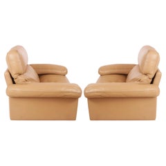 Pair of Midcentury Tan Leather Lounge Chairs by Tito Agnoli for Poltrona Frau