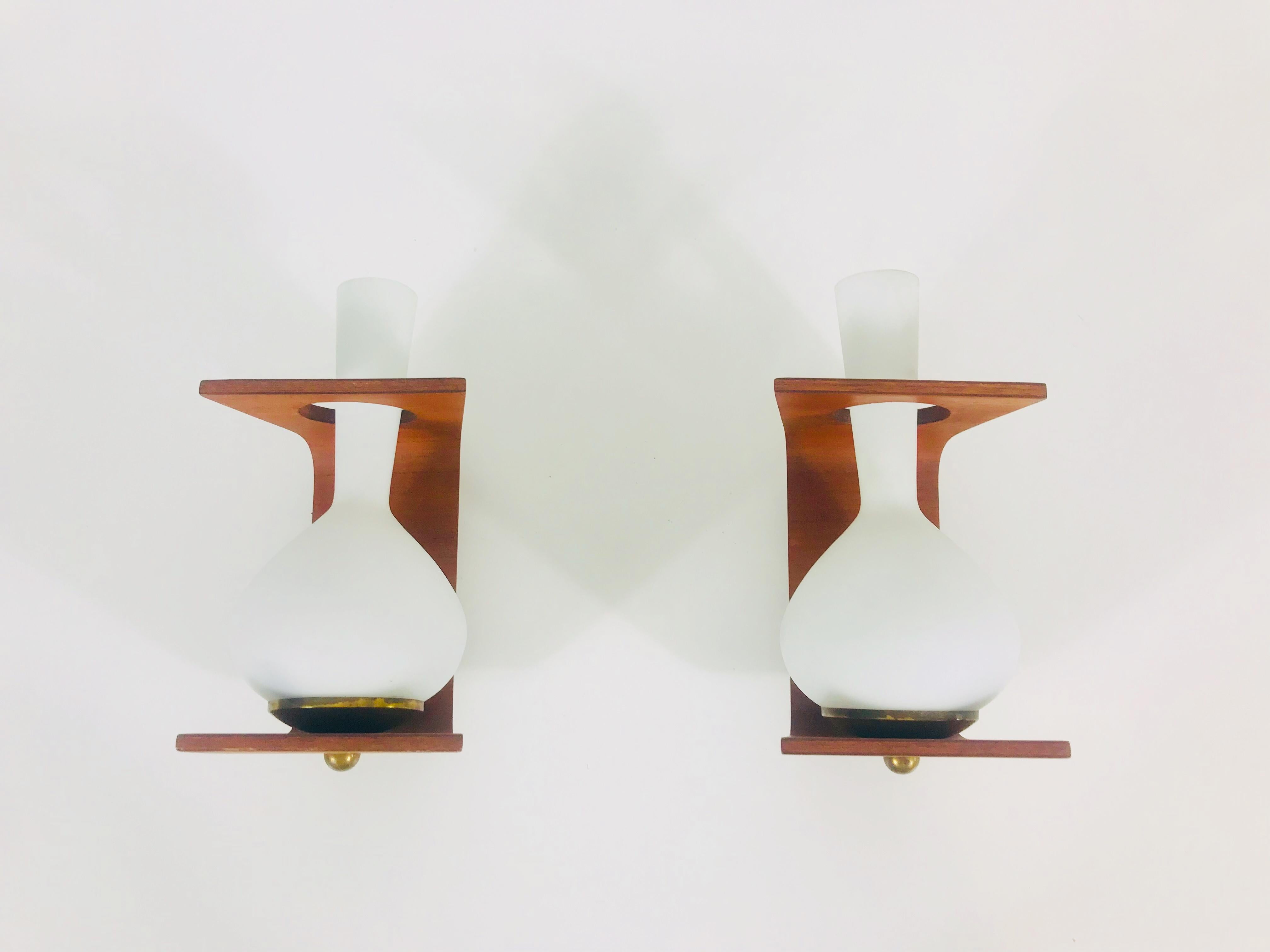 Italian Pair of Midcentury Teak and Opaque Glass Wall Lamps Stilnovo Attributed, Italy