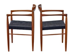 Pair of mid century teak armchairs by Bramin