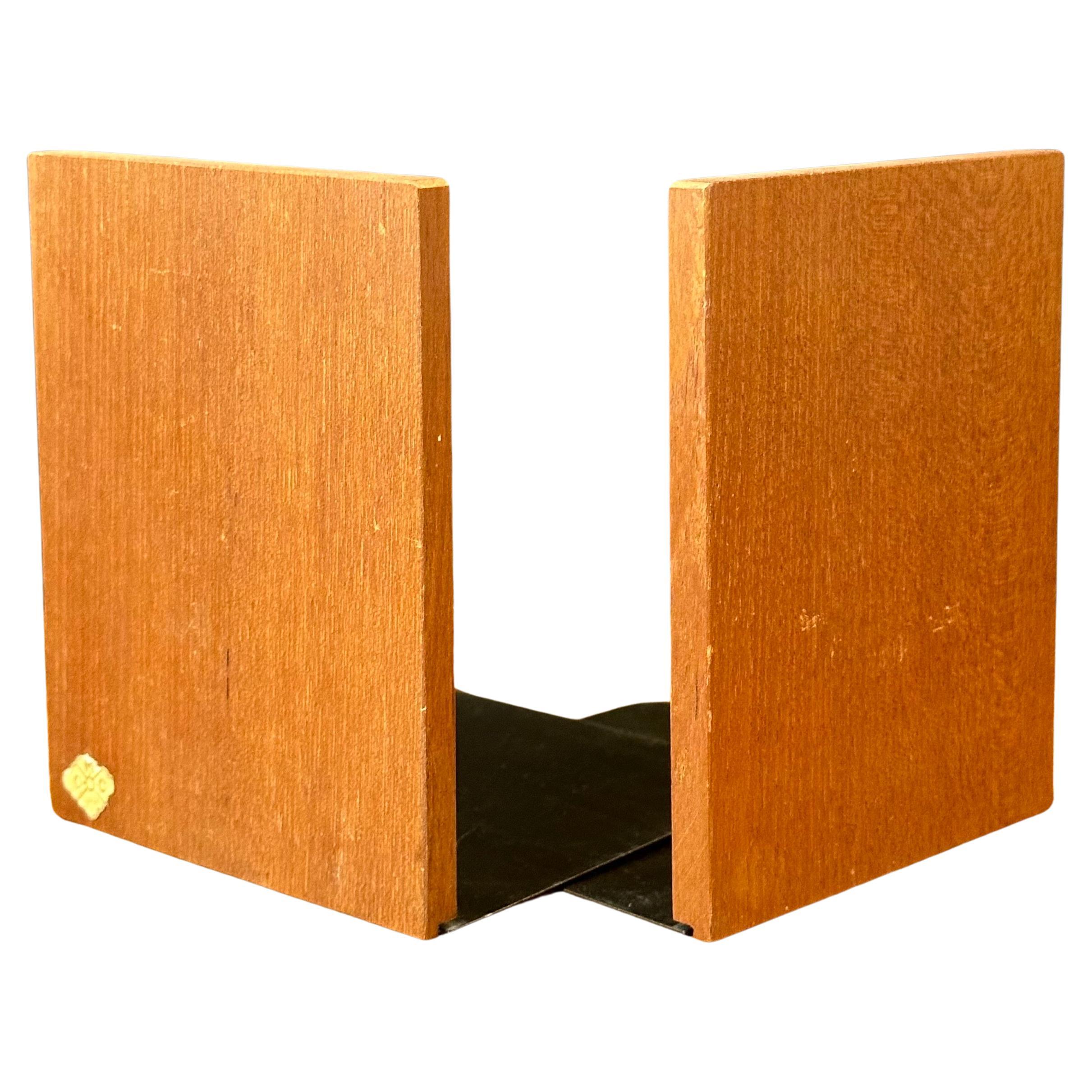 Pair of mid-century teak bookends, circa 1960s.  Two sets available.  #3559