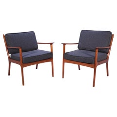 Pair of Mid Century Teak Lounge Chairs by Ole Wanscher