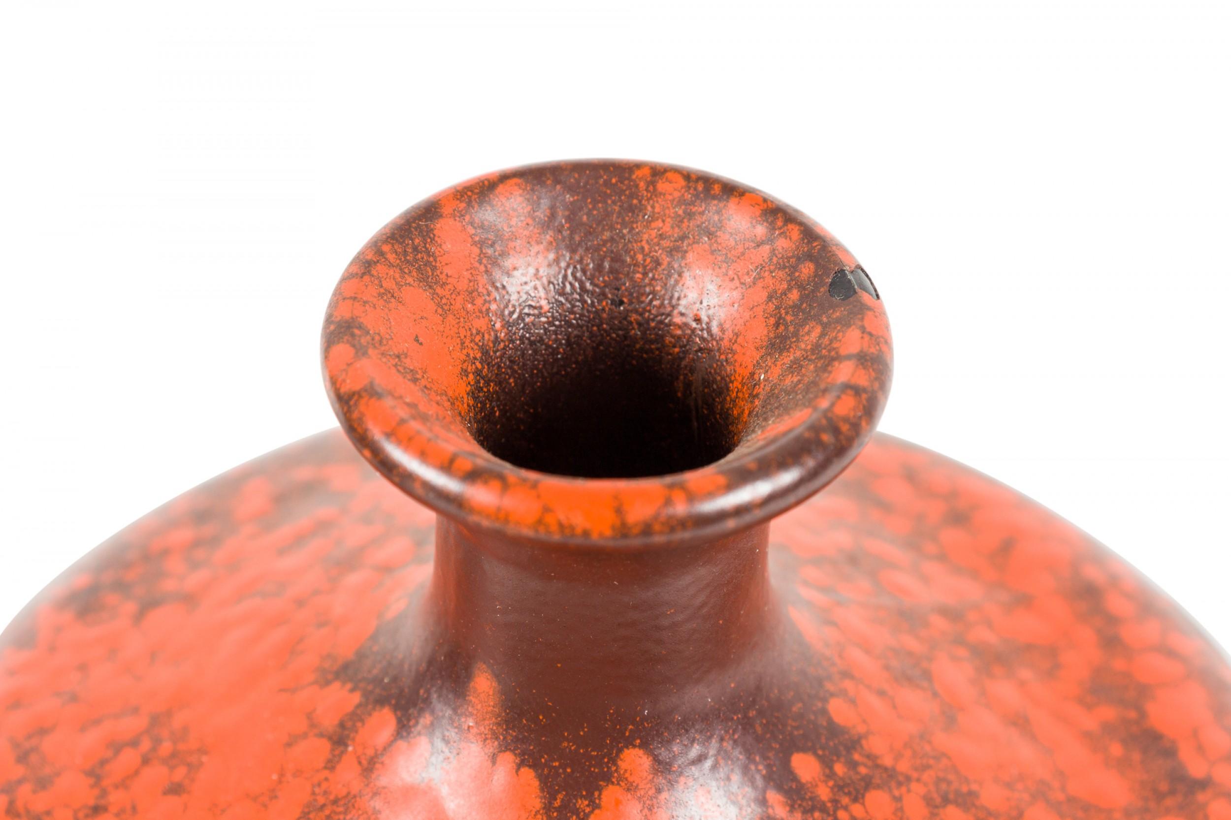 Pair of German Mid-Century ceramic vase with a bulbous body tapering to a thin neck with a flared opening, with a chocolate brown glaze specked on top with bright orange. (PRICED AS PAIR)(sticker on bottom, Nordsee 178).