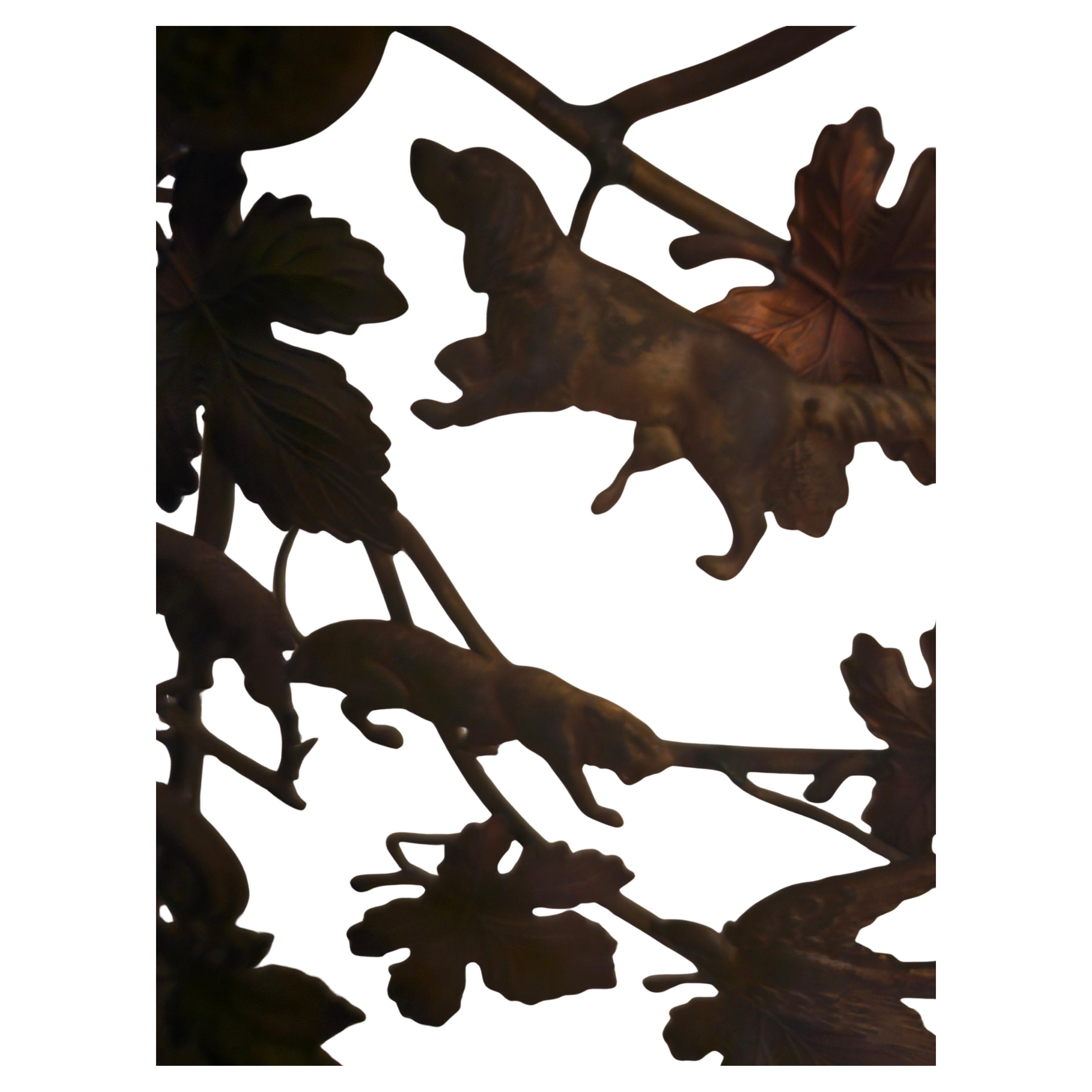 Metà XX secolo Coppia di candelabri in ottone dell'Albero della Vita della metà del secolo scorso con cigno, ippopotamo, leone e alligatore in vendita