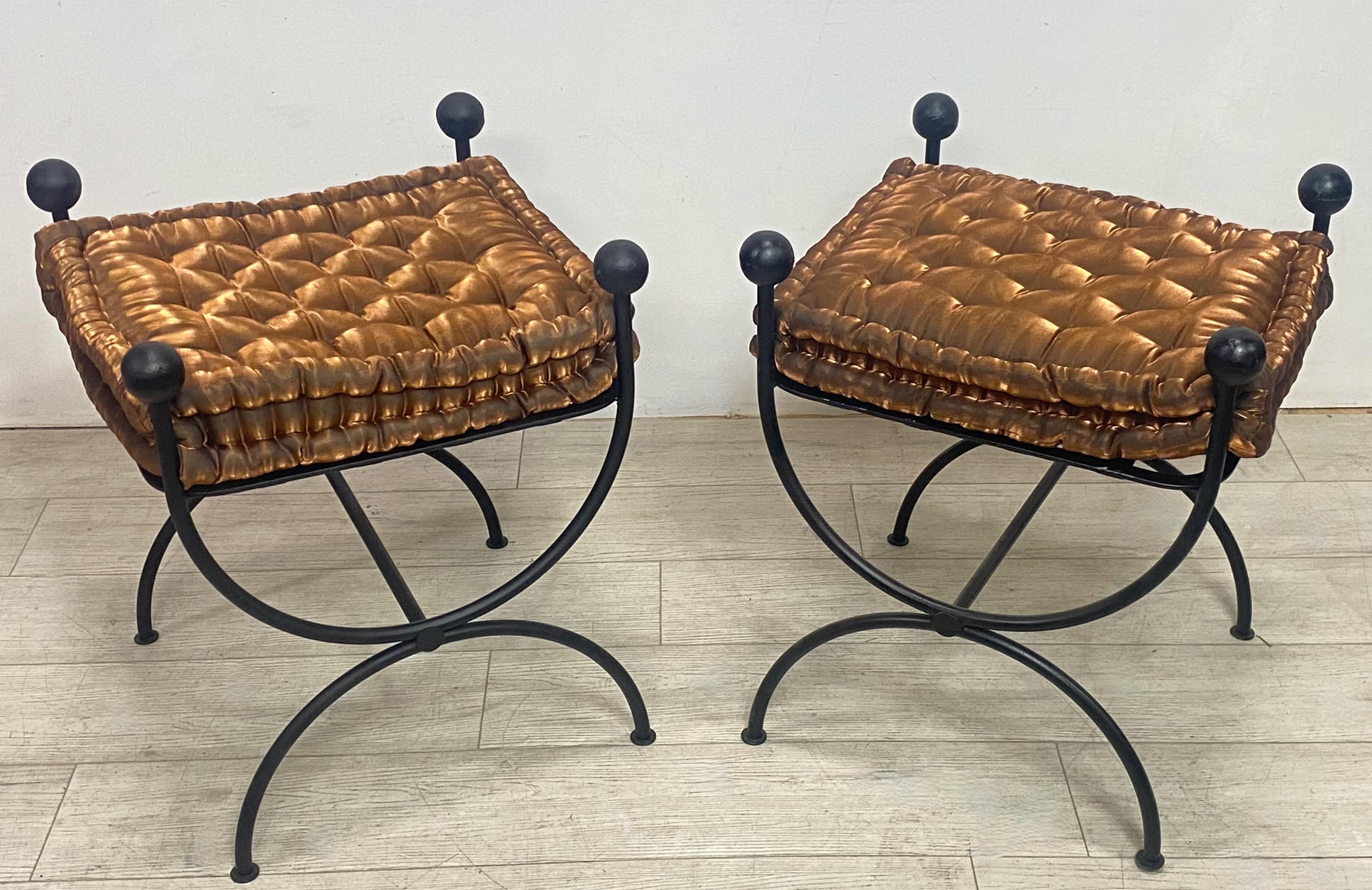 A stylish pair of iron stools or benches with copper luster fabric cushions.
Iron work recently repainted with satin black enamel.
1960's-1970's



.