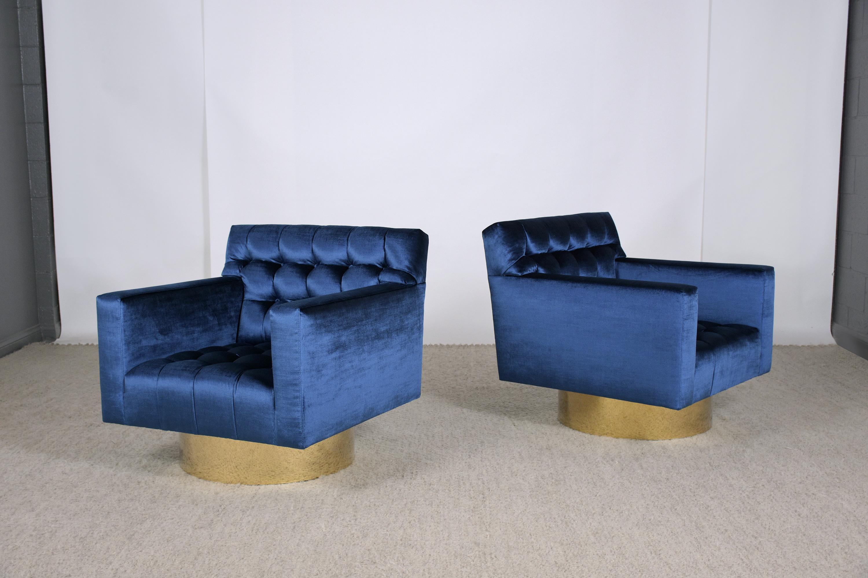 Experience the perfect fusion of vintage elegance and contemporary comfort with our pair of 1960s mid-century modern swivel lounge chairs. These chairs are handcrafted masterpieces, professionally reupholstered by our expert craftsmen to ensure the