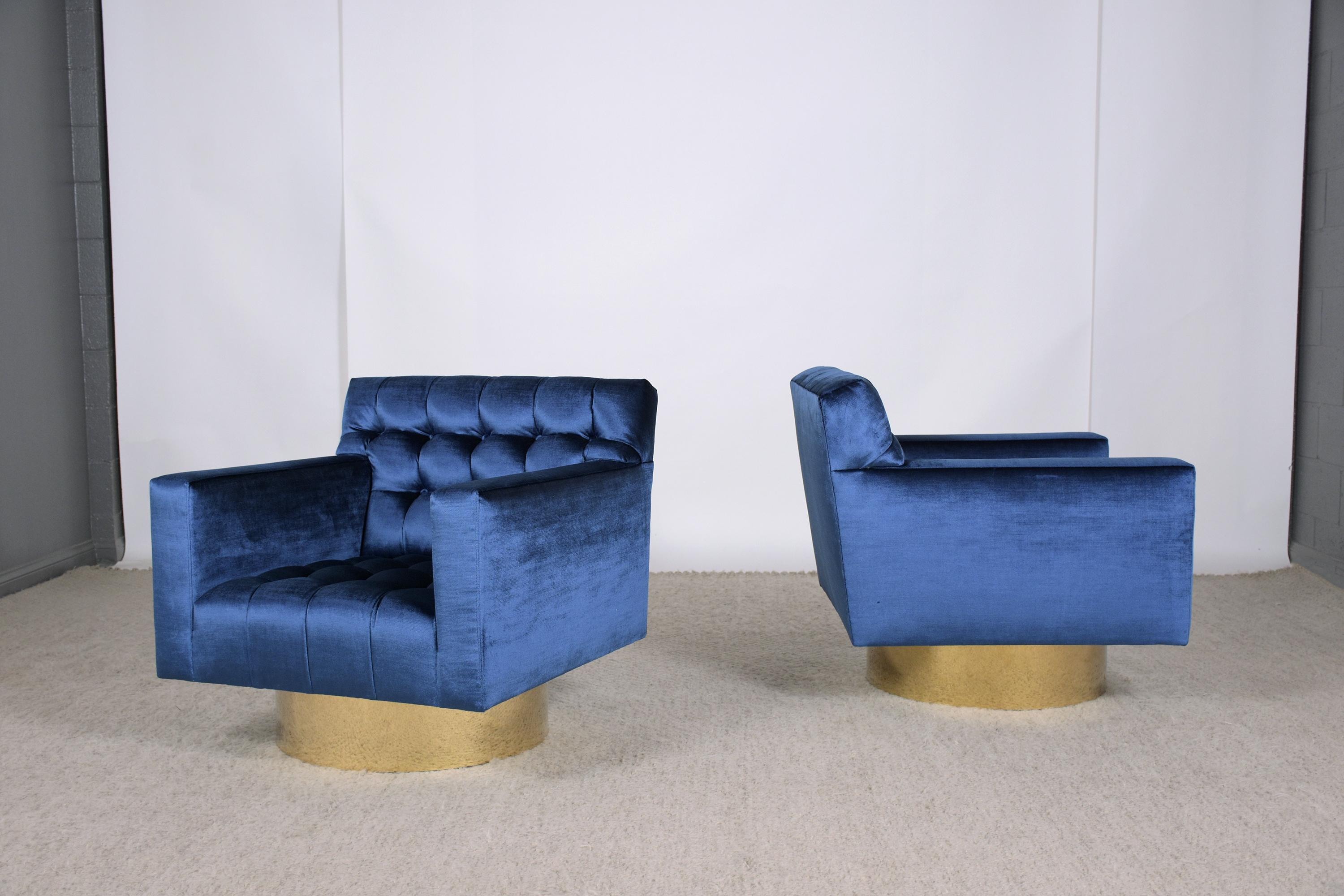 American 1960s Blue Velvet Mid-Century Modern Swivel Lounge Chairs with Brass Bases For Sale