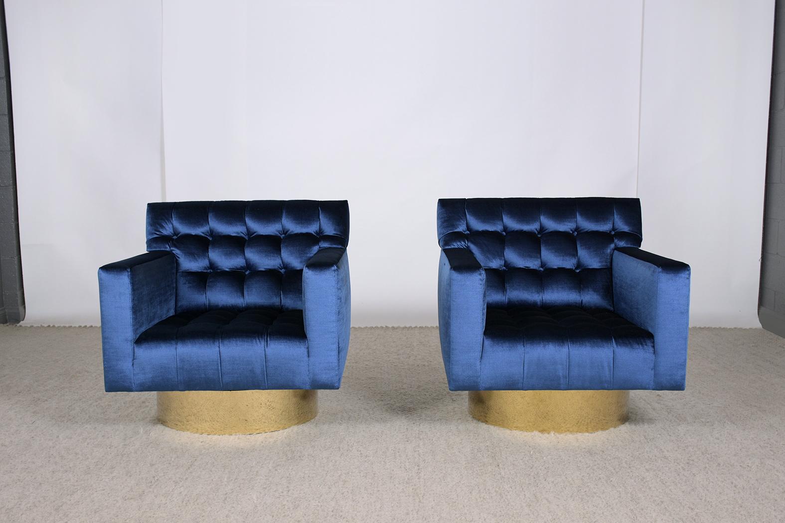 Wood 1960s Blue Velvet Mid-Century Modern Swivel Lounge Chairs with Brass Bases For Sale