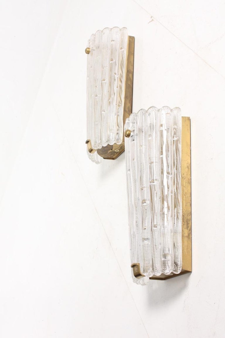 Scandinavian Modern Pair of Midcentury Wall Sconces Designed by Carl Fagerlund for Orrefors Glass For Sale