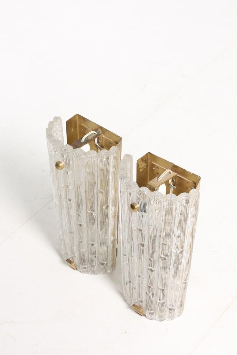 Swedish Pair of Midcentury Wall Sconces Designed by Carl Fagerlund for Orrefors Glass For Sale