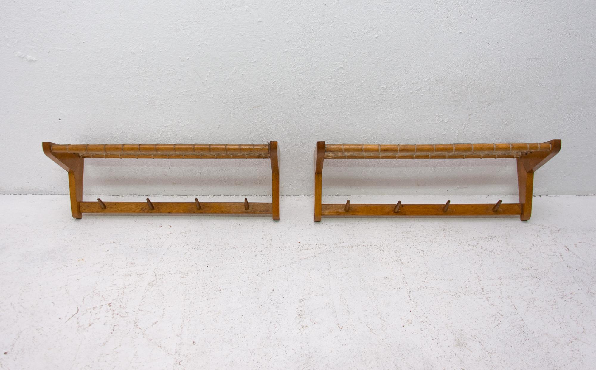 Pair of midcentury wall shelves, made in the former Czechoslovakia in the 1960s. It was produced by Krásná Jizba Company. It’s made of beechwood and an intertwined upper part. In very good vintage condition. Price is for the pair.