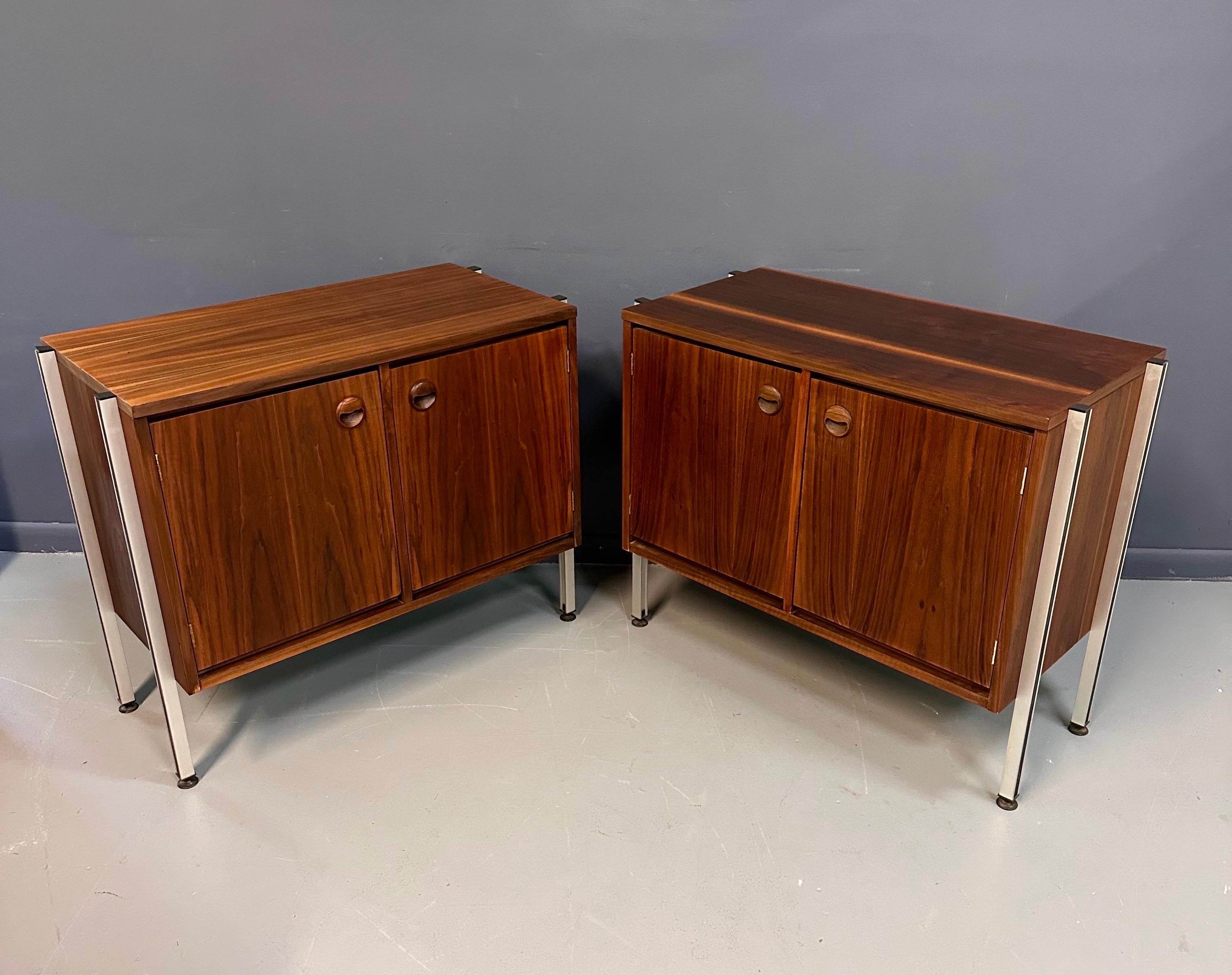 These two cabinets crafted out of extraordinary beautiful walnut each have two doors and a single shelf inside. The exterior legs have adjustable feet to level to any surface. So good looking these pieces were probably sold in an office environment