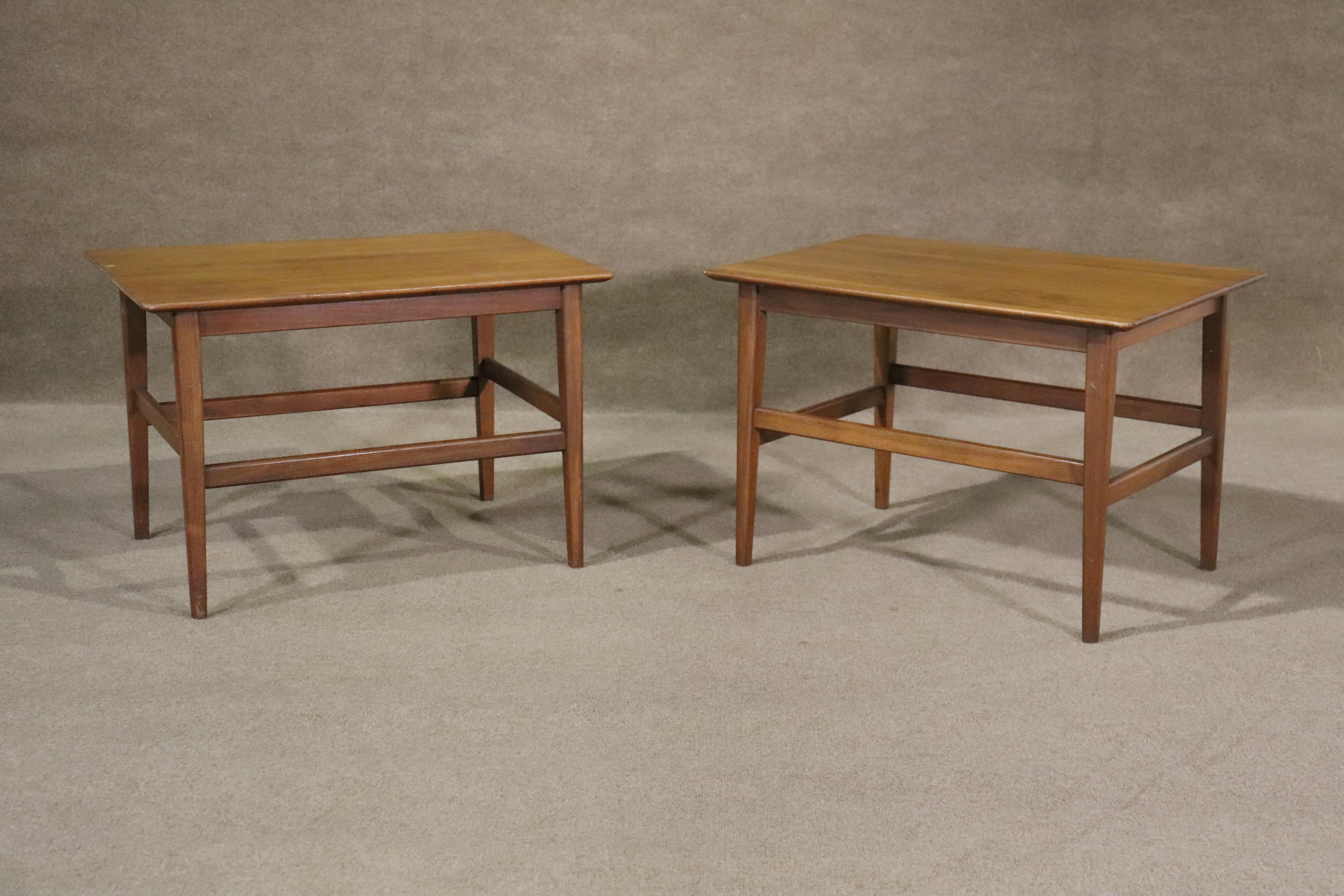 Pair of Mid-century modern walnut end tables fit for a variety of spaces besides just the bedroom. Large table top allows for lots of storage.

Please confirm location (NY or NJ)