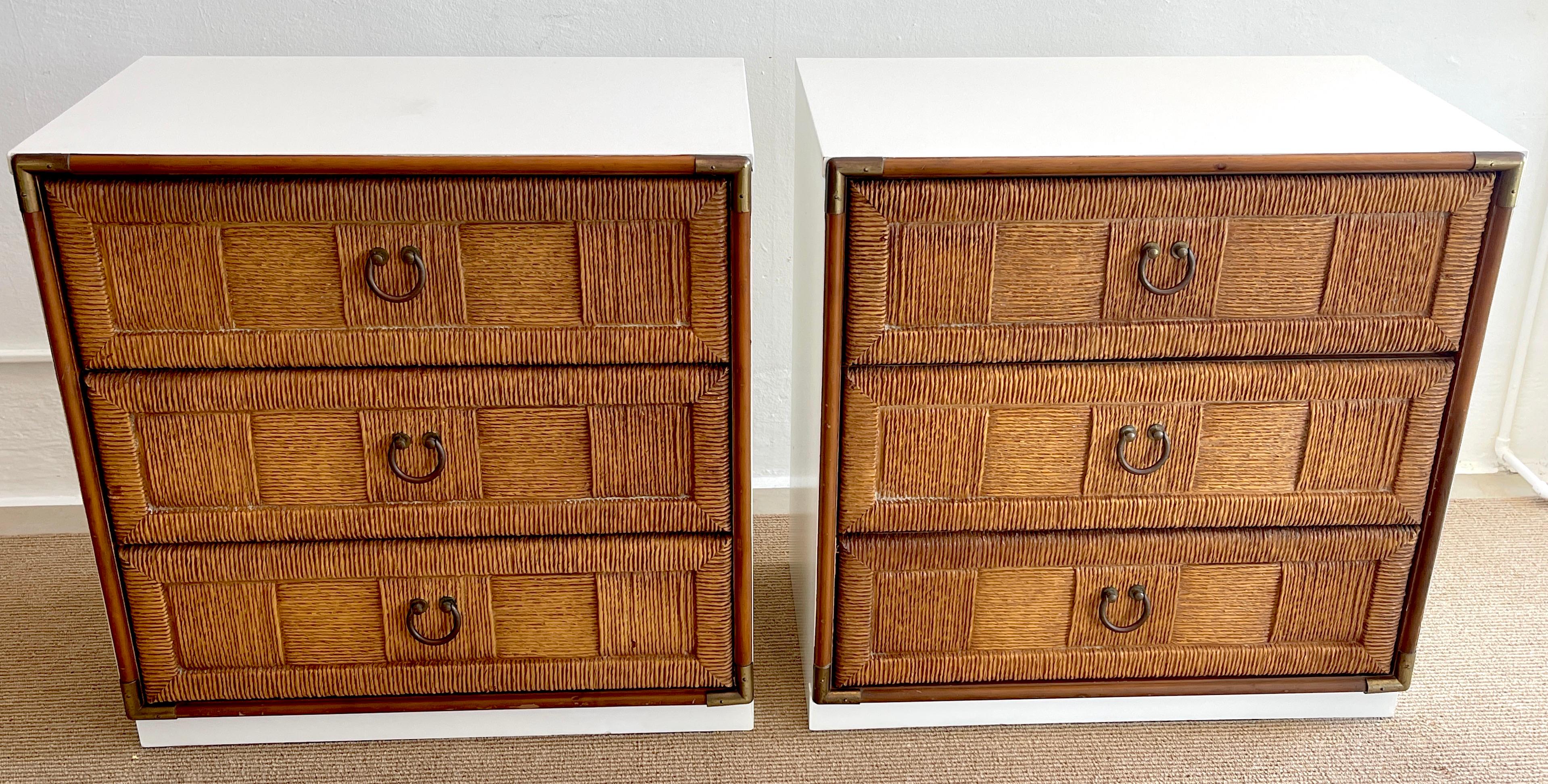 Pair of mid century white lacquered faux rattan chests or nightstands, each one of rectangular form, fitted with three 28