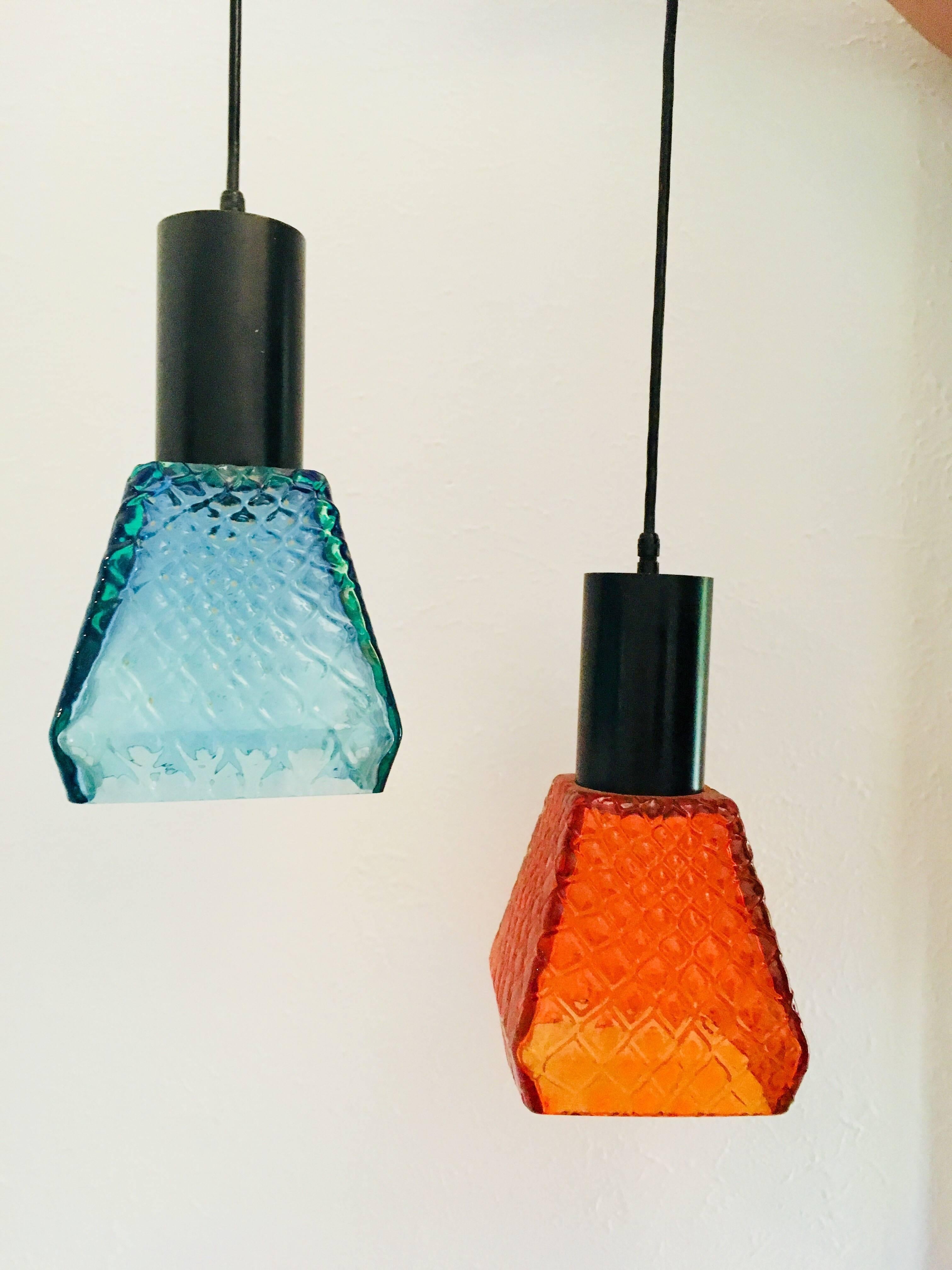 Pair of midcentury Whitefriars pendant lights, 1960s. In very good original order, some very minor wear commensurate with age.

A beautiful example of Whitefriars Glass.
 