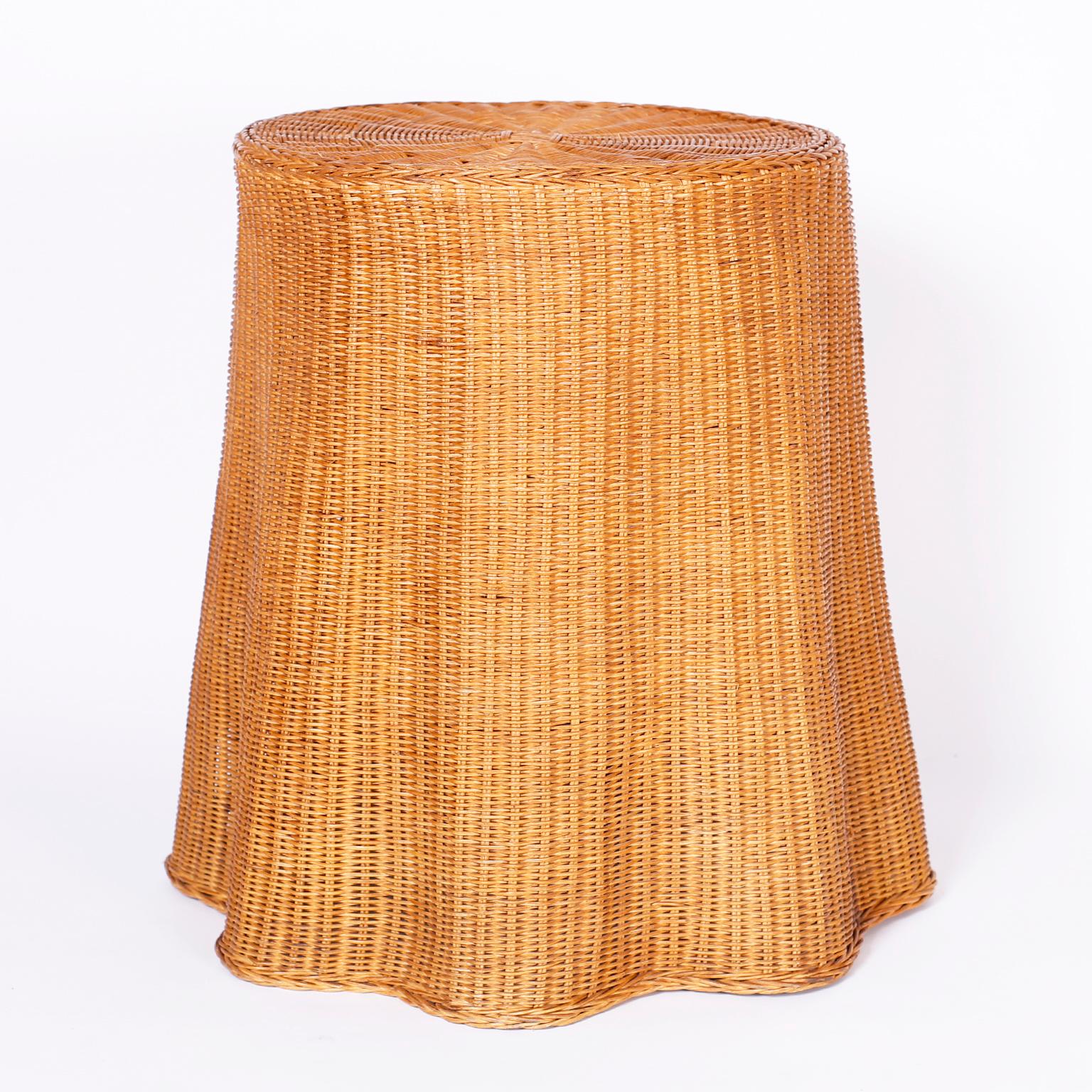 Pair of midcentury, wicker ghost side tables or stands with chic faux drapery design.