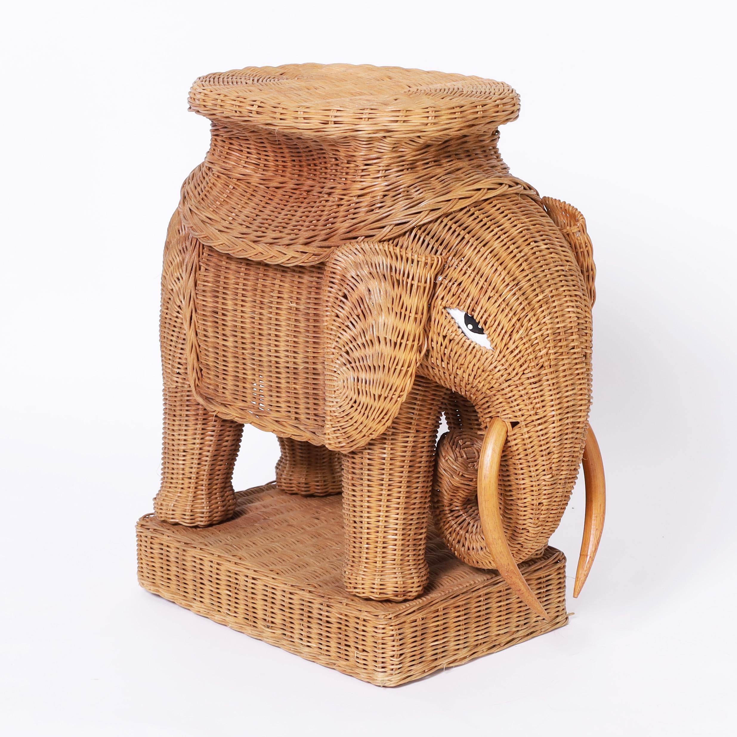 Whimsical pair of vintage Italian elephant drink or fern stands handcrafted in stick wicker with wood tusks and painted eyes.