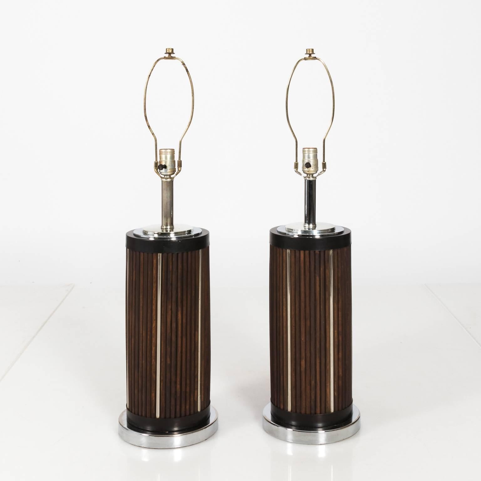 Reeded wood and chrome lamps with matching shades, circa mid-20th century.
 