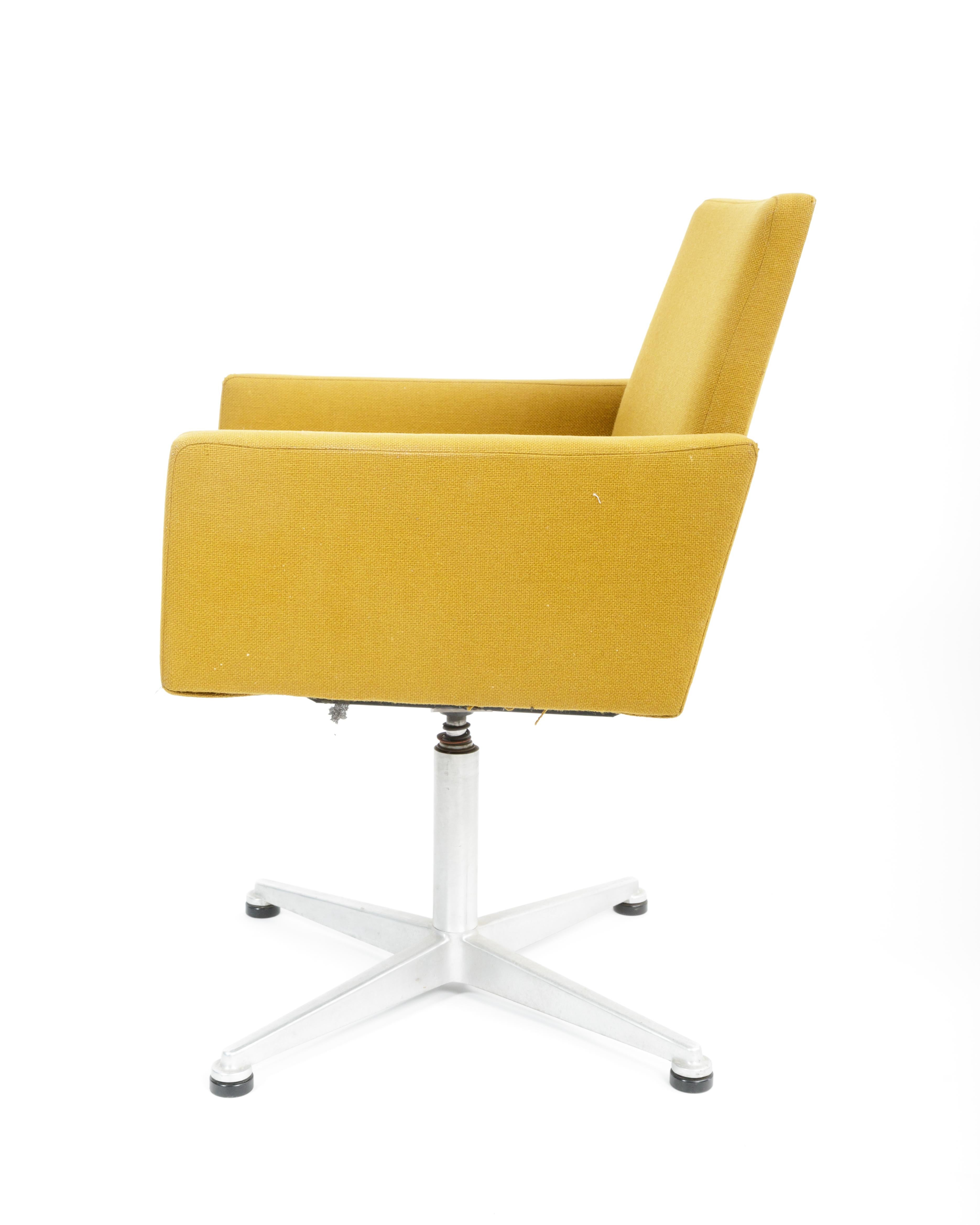 yellow swivel chair