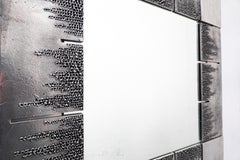 Pair of Mid-Centuy Sculpted Metal Mirrors by Bianca Garinei, Italy 1970s