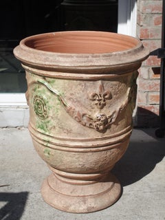 Pair of Mid Sized Distressed Terra Cotta Planters from Anduze, France