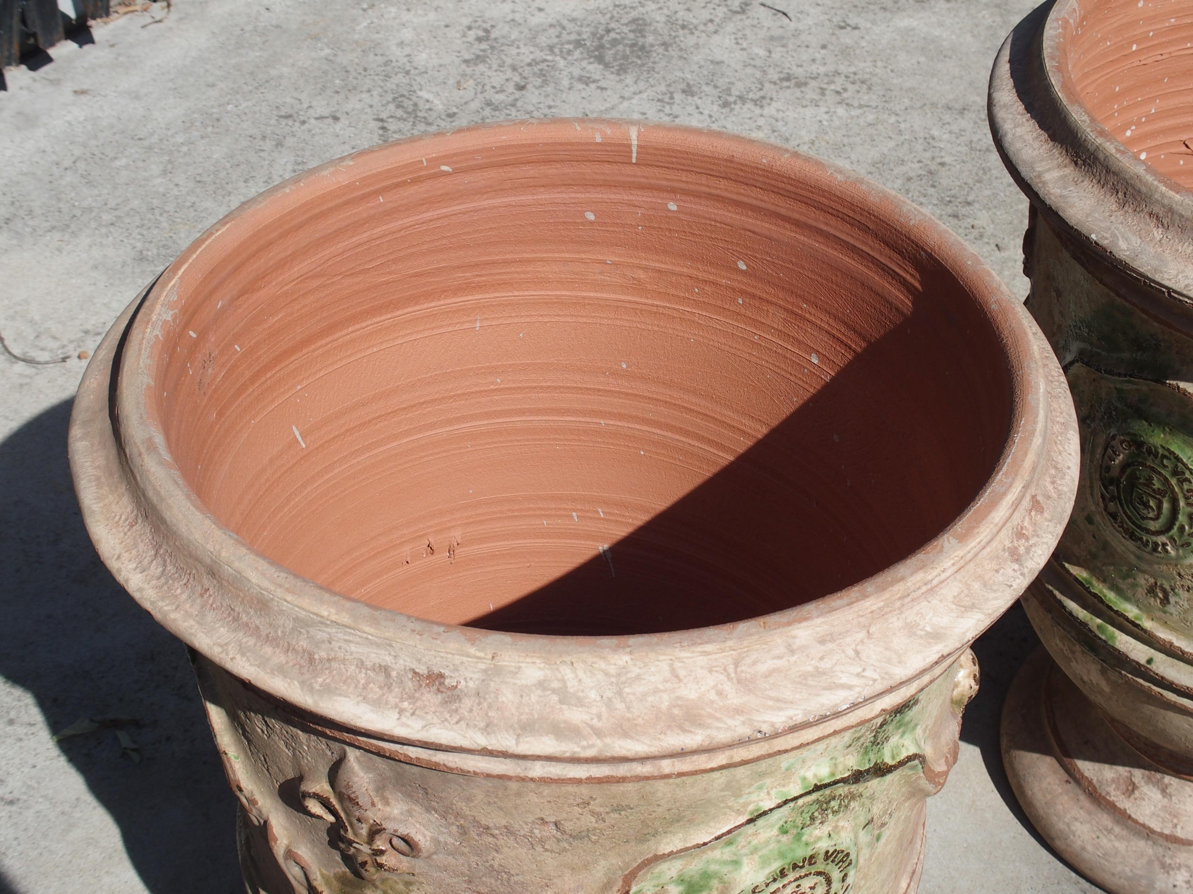 French Pair of Mid Sized Distressed Terra Cotta Planters from Anduze, France