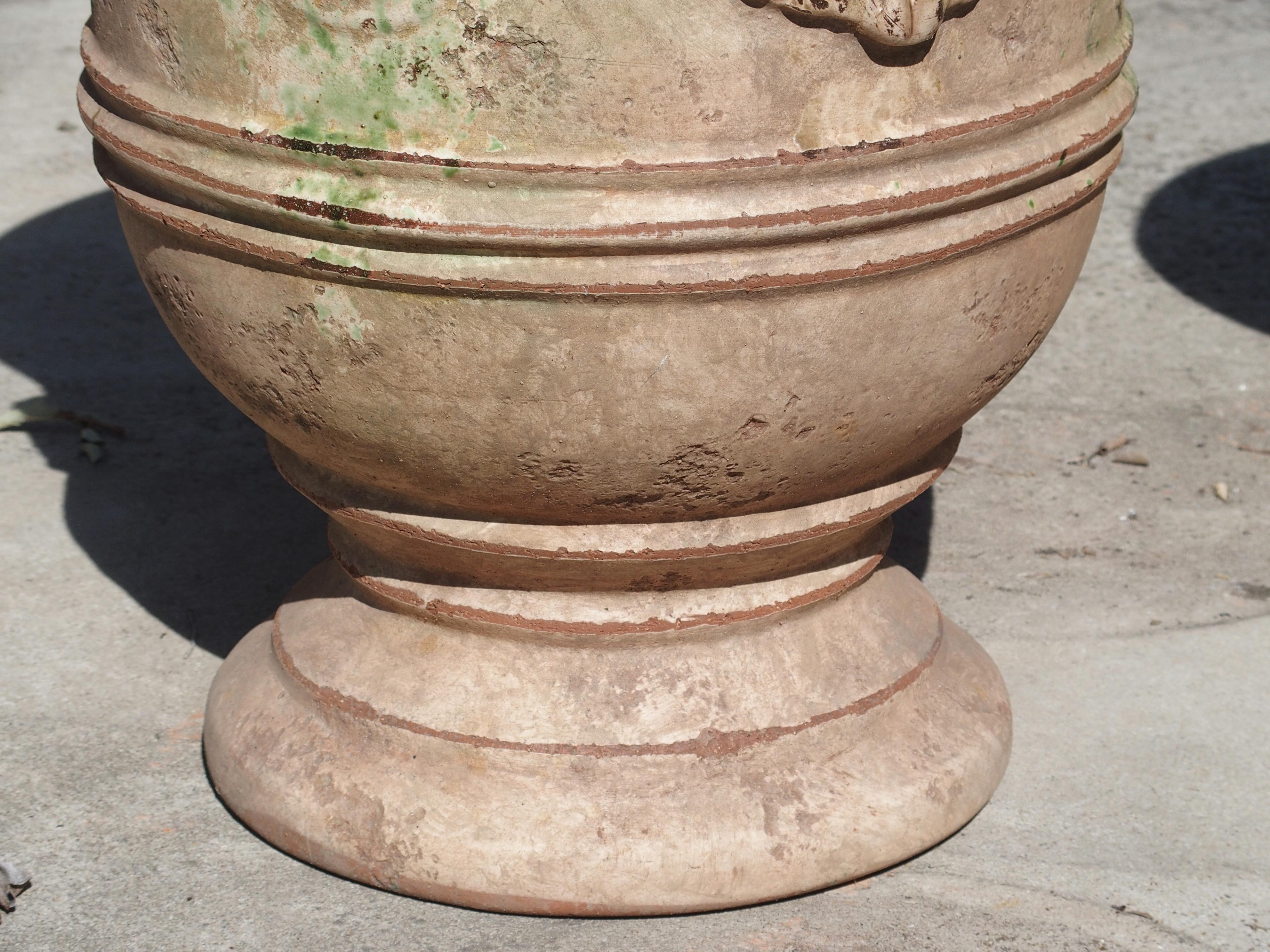 Contemporary Pair of Mid Sized Distressed Terra Cotta Planters from Anduze, France