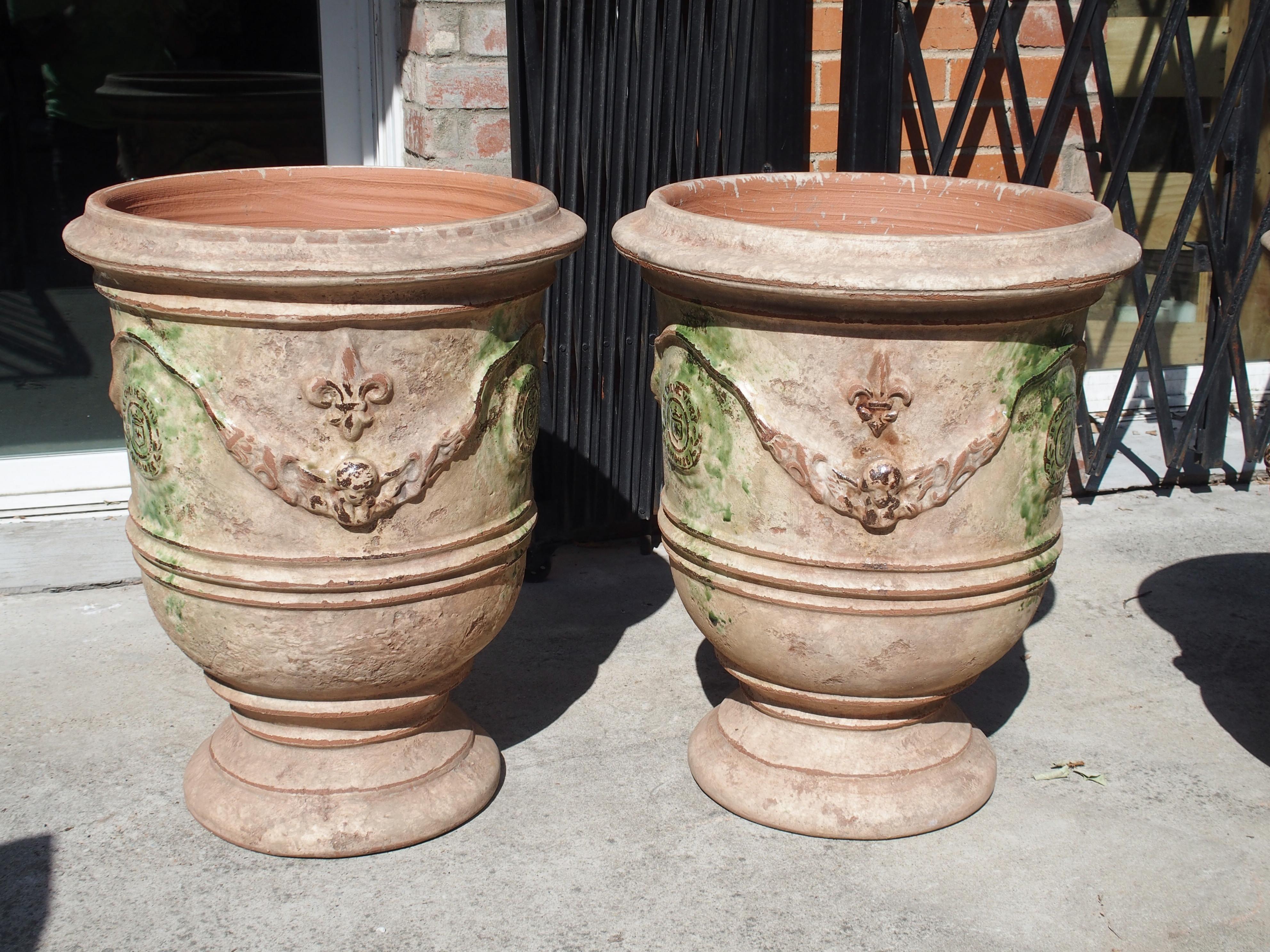 Pair of Mid Sized Distressed Terra Cotta Planters from Anduze, France 1