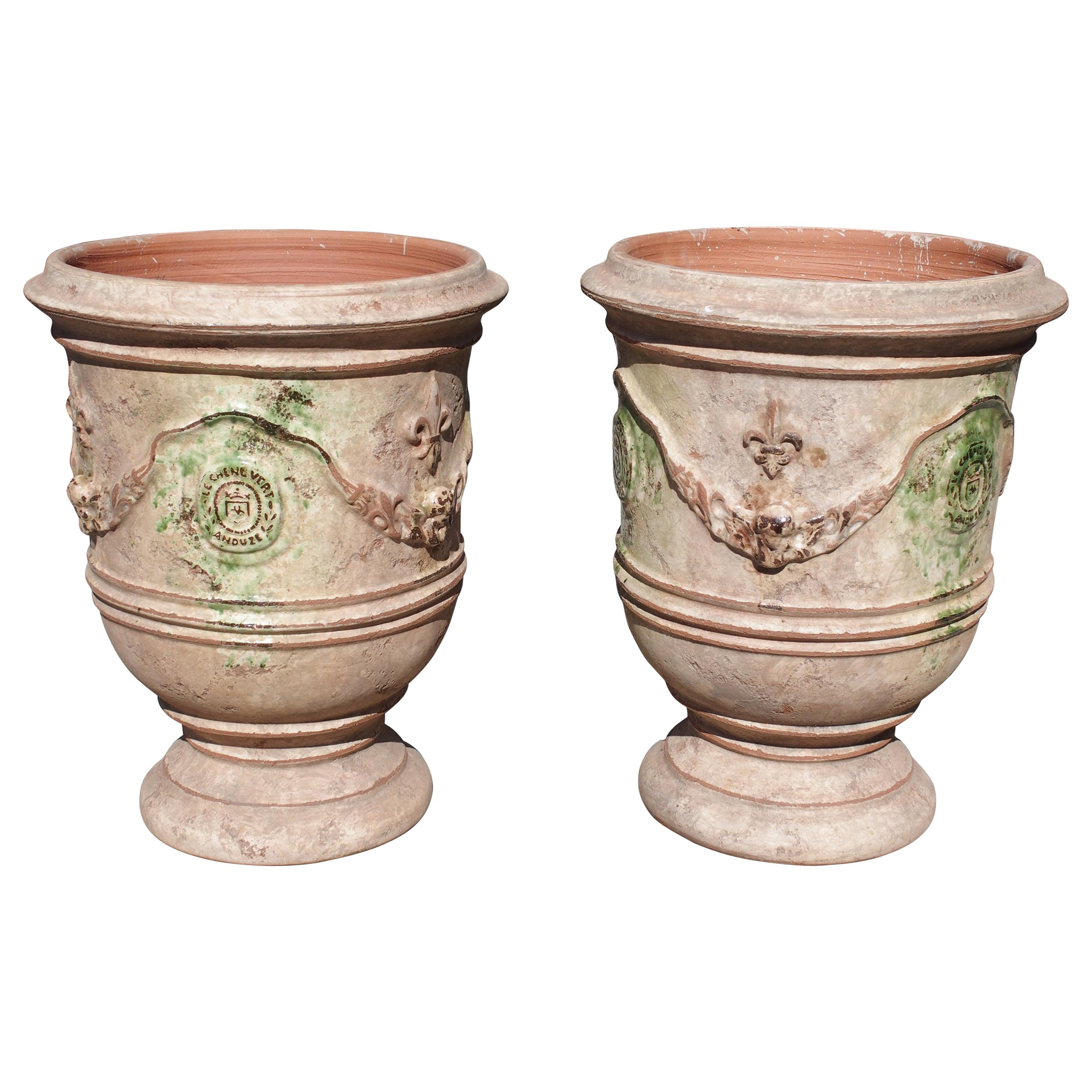 Pair of Mid Sized Distressed Terra Cotta Planters from Anduze, France