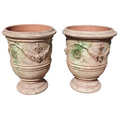 Pair of Mid Sized Distressed Terra Cotta Planters from Anduze, France