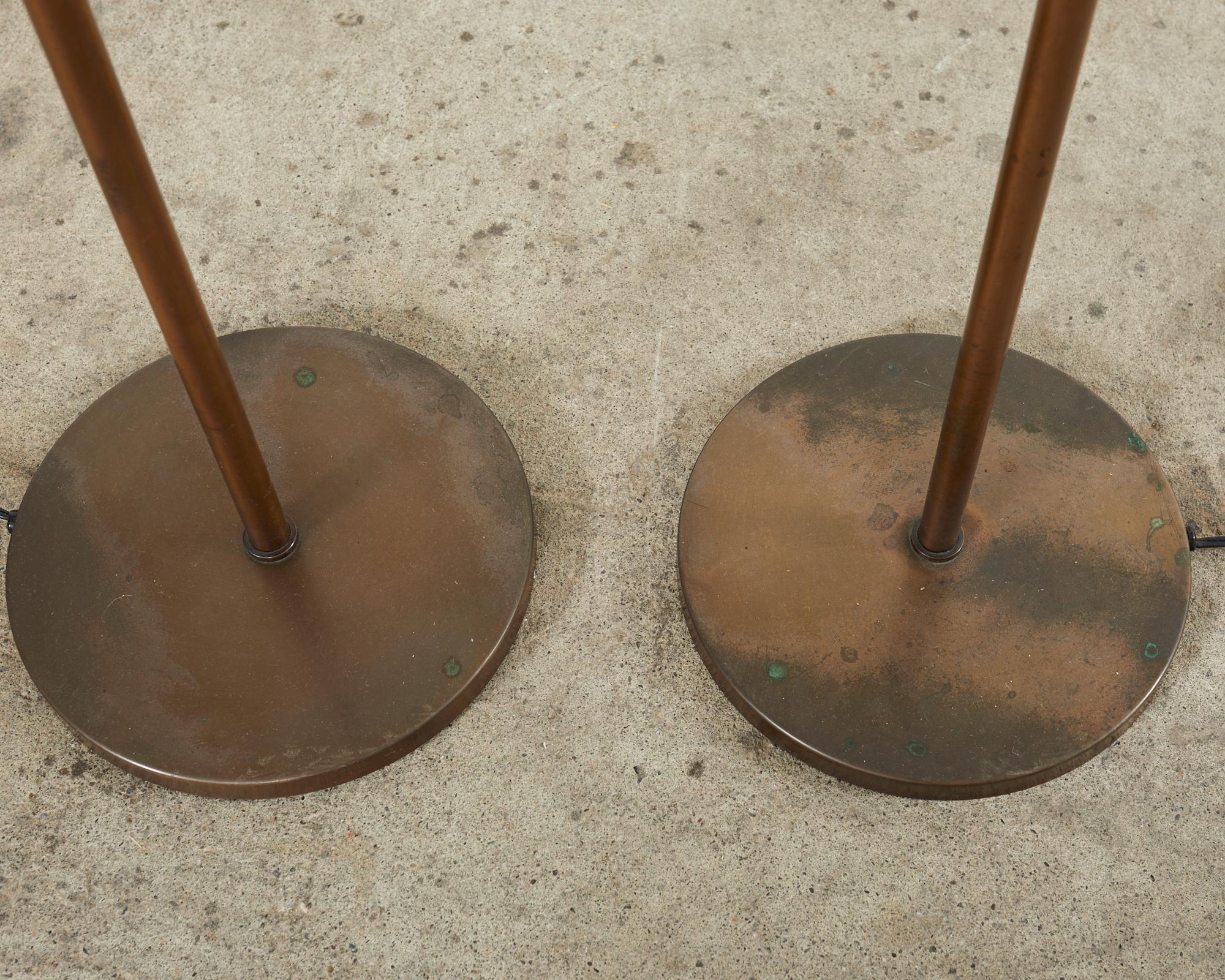 Metal Pair of Midcentury Adjustable Height Bronzed Pharmacy Floor Lamps For Sale