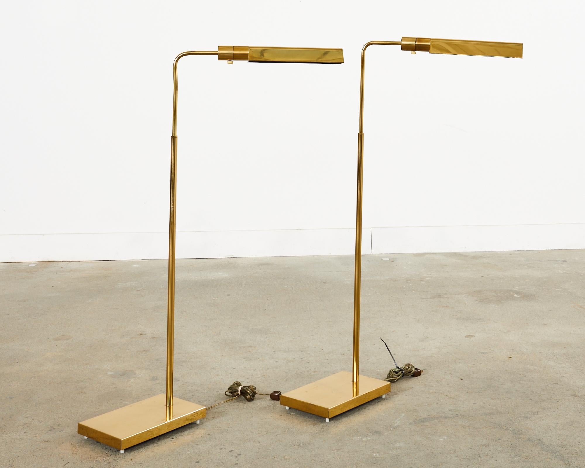 Patinated Pair of Midcentury Adjustable Pharmacy Brass Floor Lamps by Casella